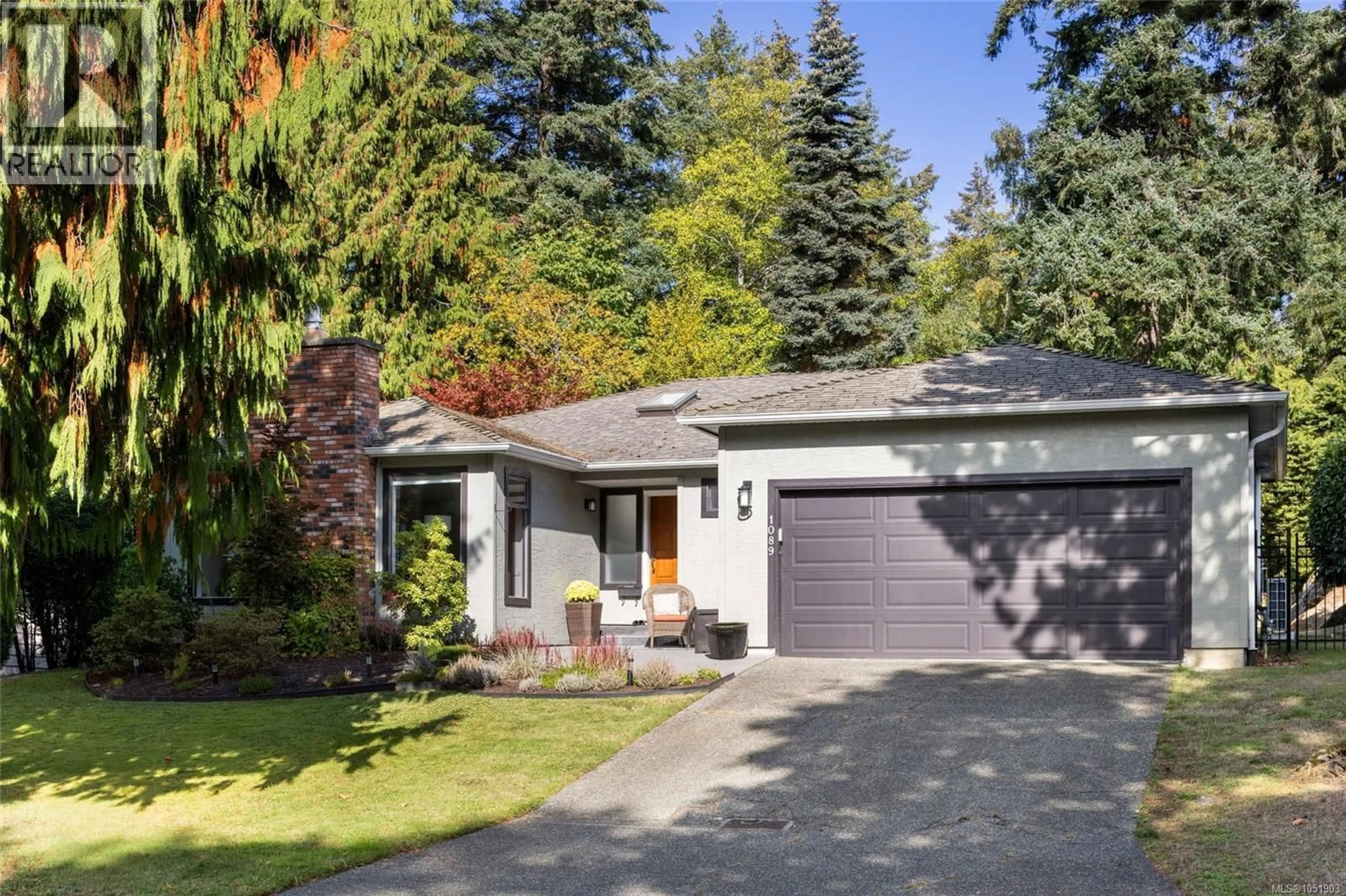 Home with vinyl exterior material, street for 1089 DONWOOD DRIVE, Saanich British Columbia V8X4G3