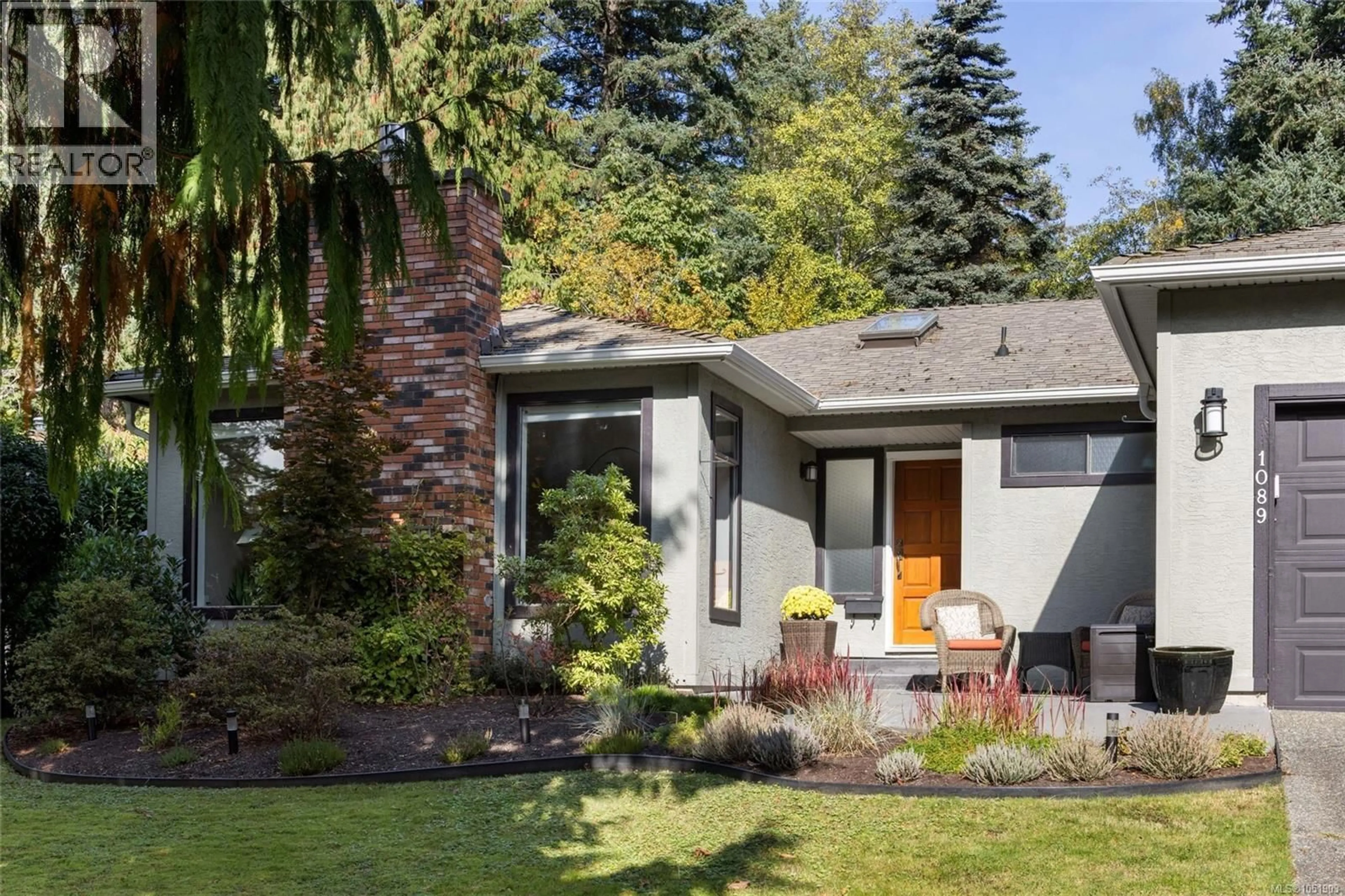 Home with vinyl exterior material, street for 1089 DONWOOD DRIVE, Saanich British Columbia V8X4G3