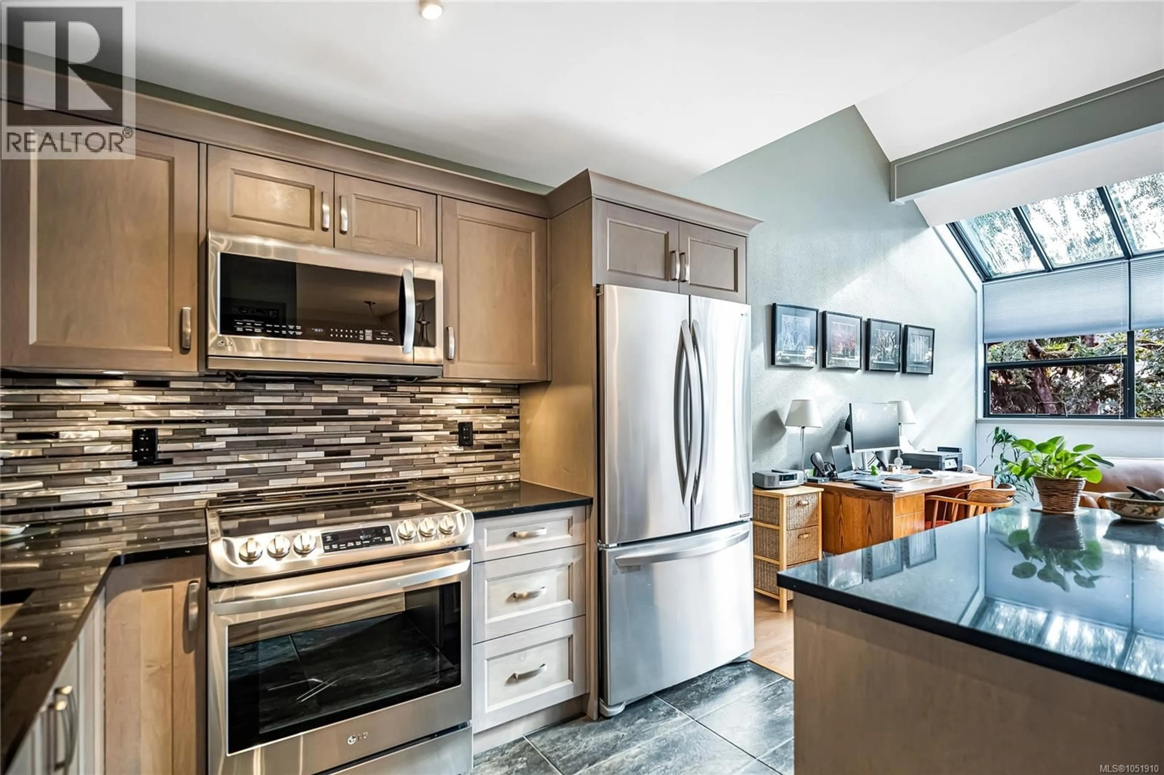 Contemporary kitchen, ceramic/tile floor for 464E - 4678 ELK LAKE DRIVE, Saanich British Columbia V8Z5M1