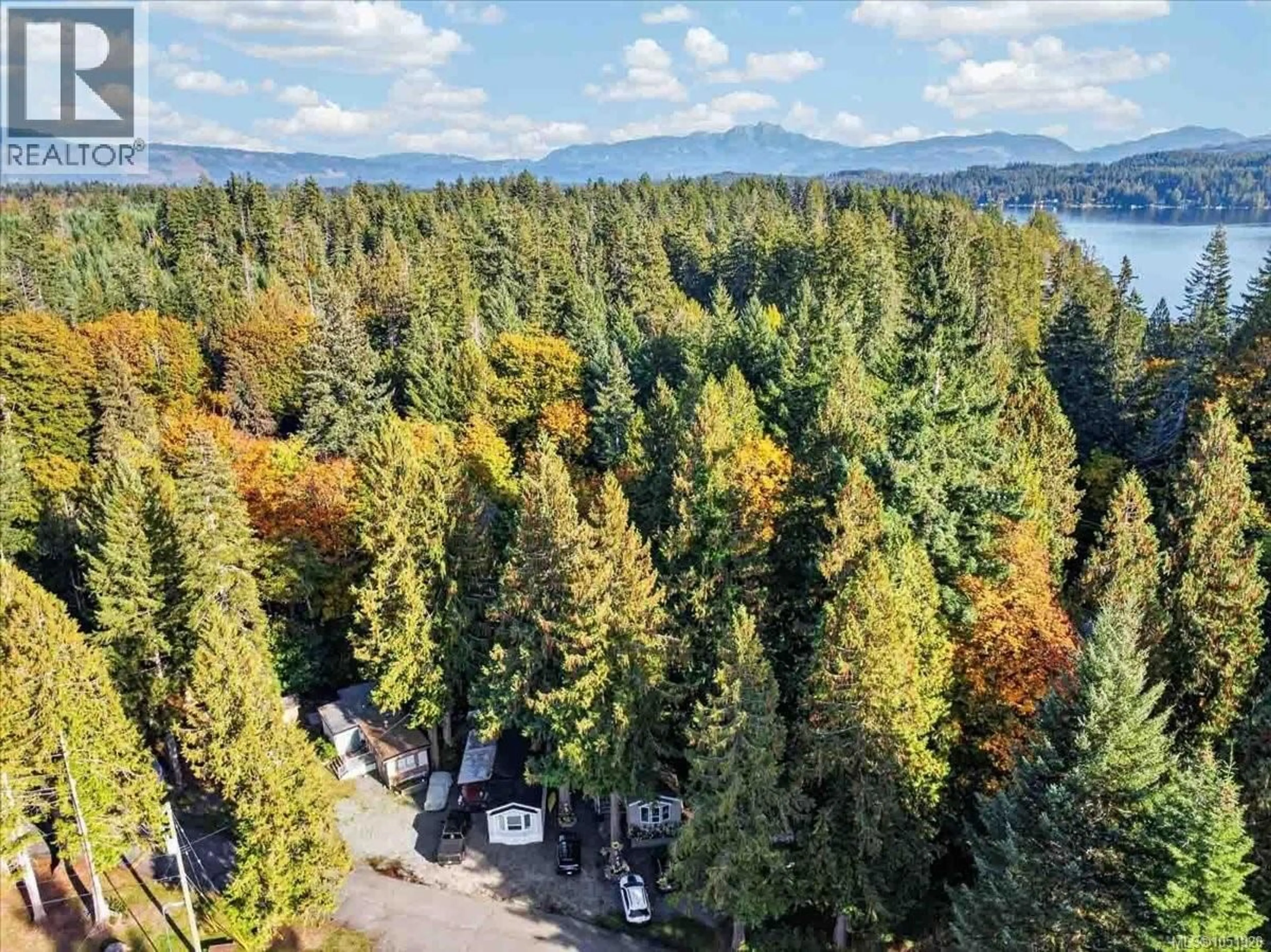 A pic from outside/outdoor area/front of a property/back of a property/a pic from drone, forest/trees view for 3 - 10325 LAKESHORE ROAD, Port Alberni British Columbia V9Y8Z6