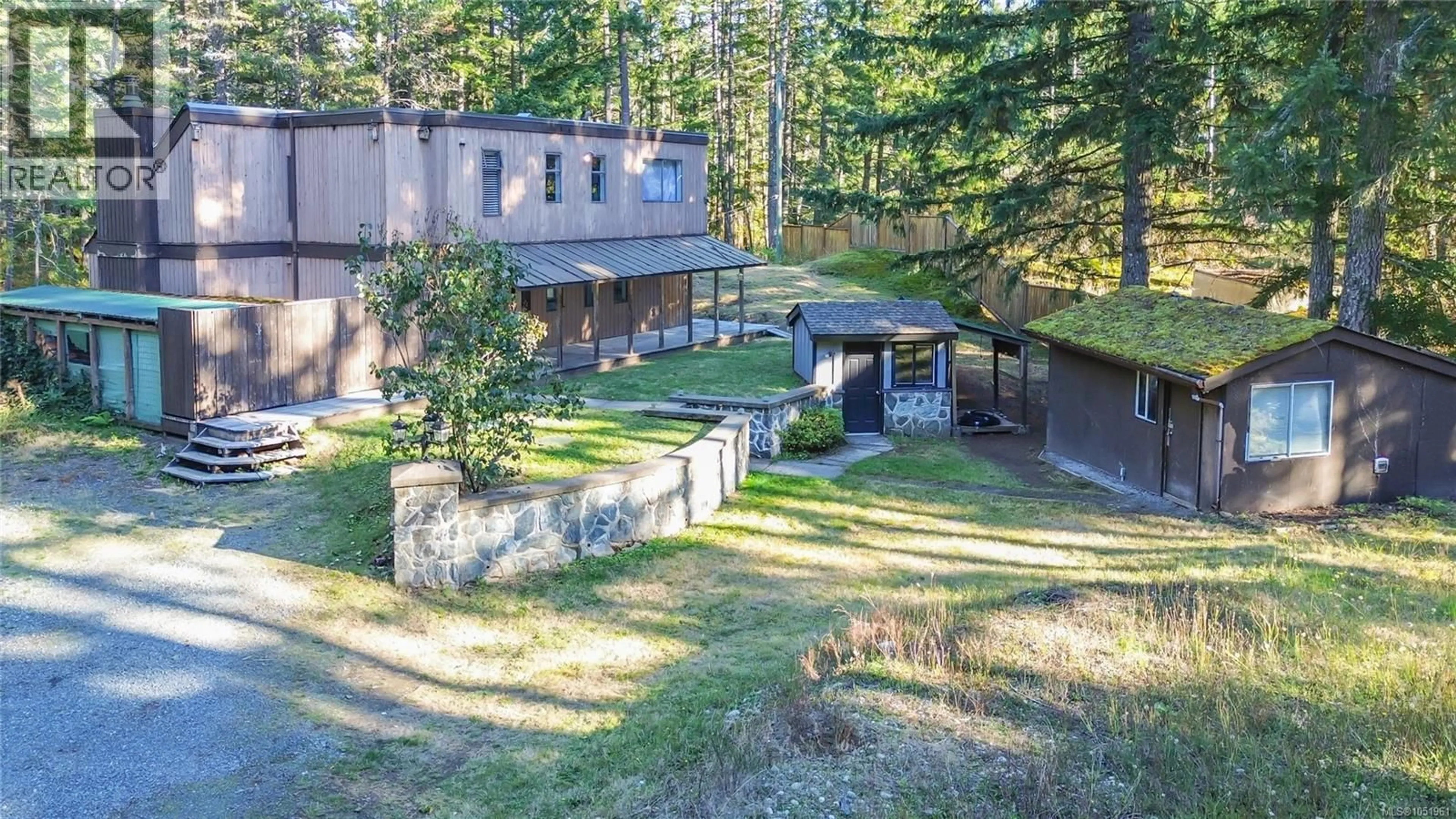 A pic from outside/outdoor area/front of a property/back of a property/a pic from drone, forest/trees view for 821 EBADORA LANE, Malahat British Columbia V0R2L0