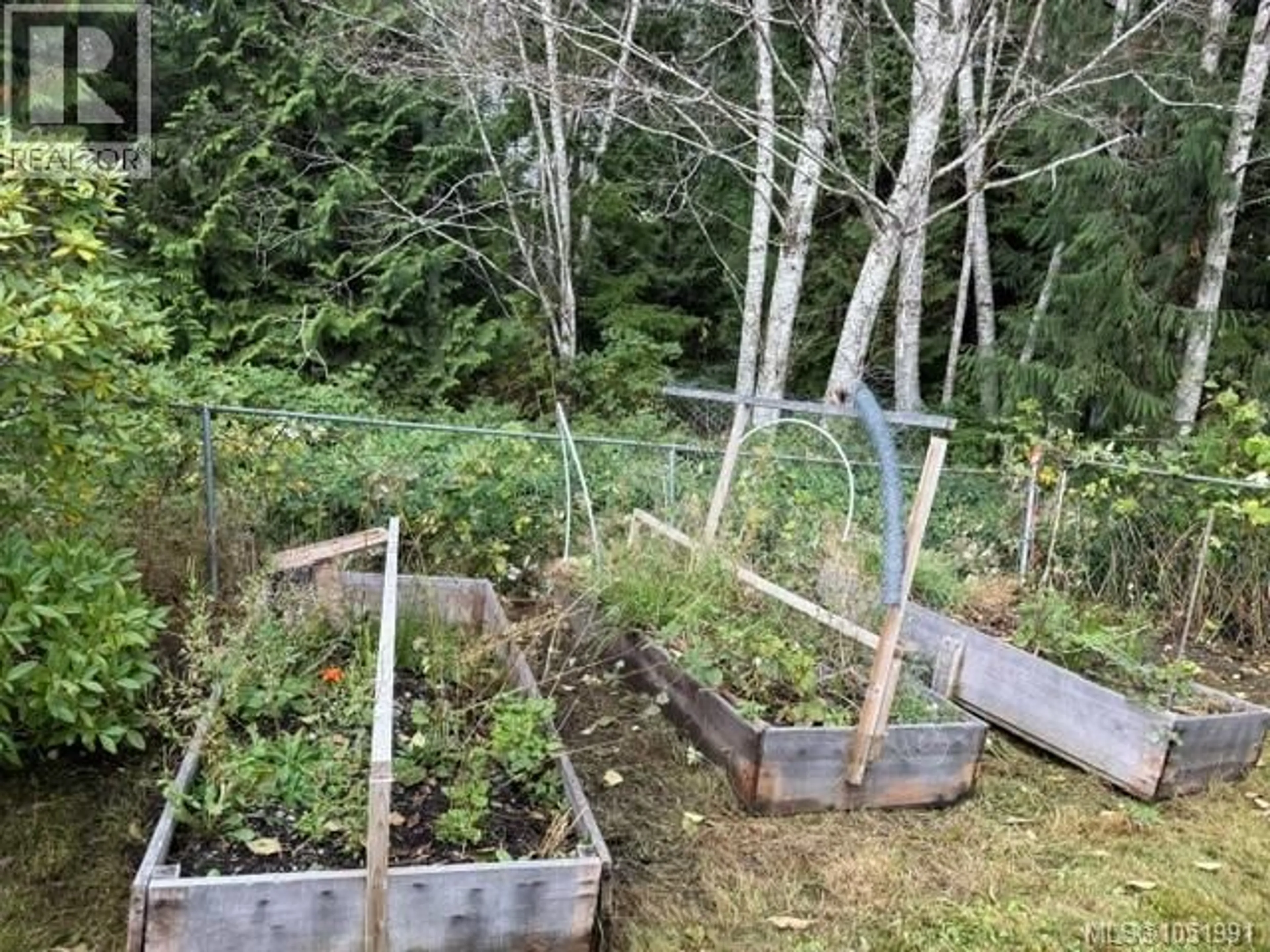 A pic from outside/outdoor area/front of a property/back of a property/a pic from drone, forest/trees view for 7725 DUVAL AVENUE, Port Hardy British Columbia V0N2P0