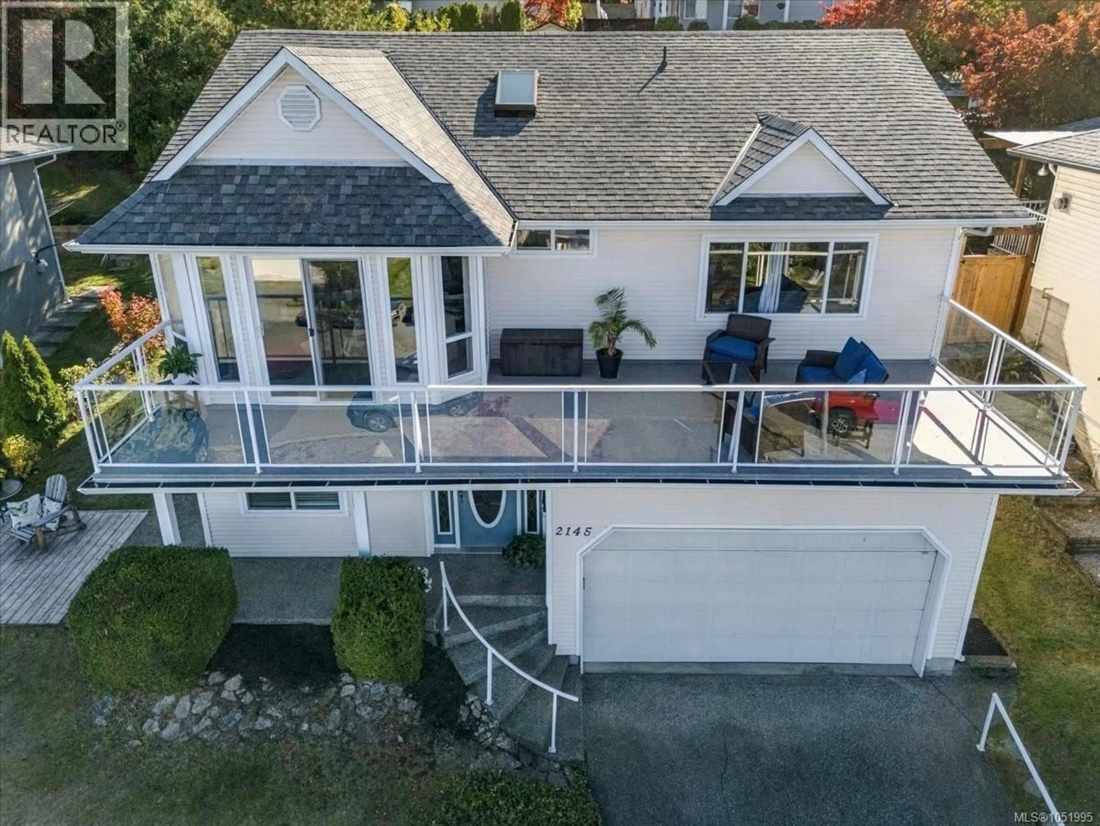 A pic from outside/outdoor area/front of a property/back of a property/a pic from drone, unknown for 2145 WOODTHRUSH PLACE, Nanaimo British Columbia V9R6V3