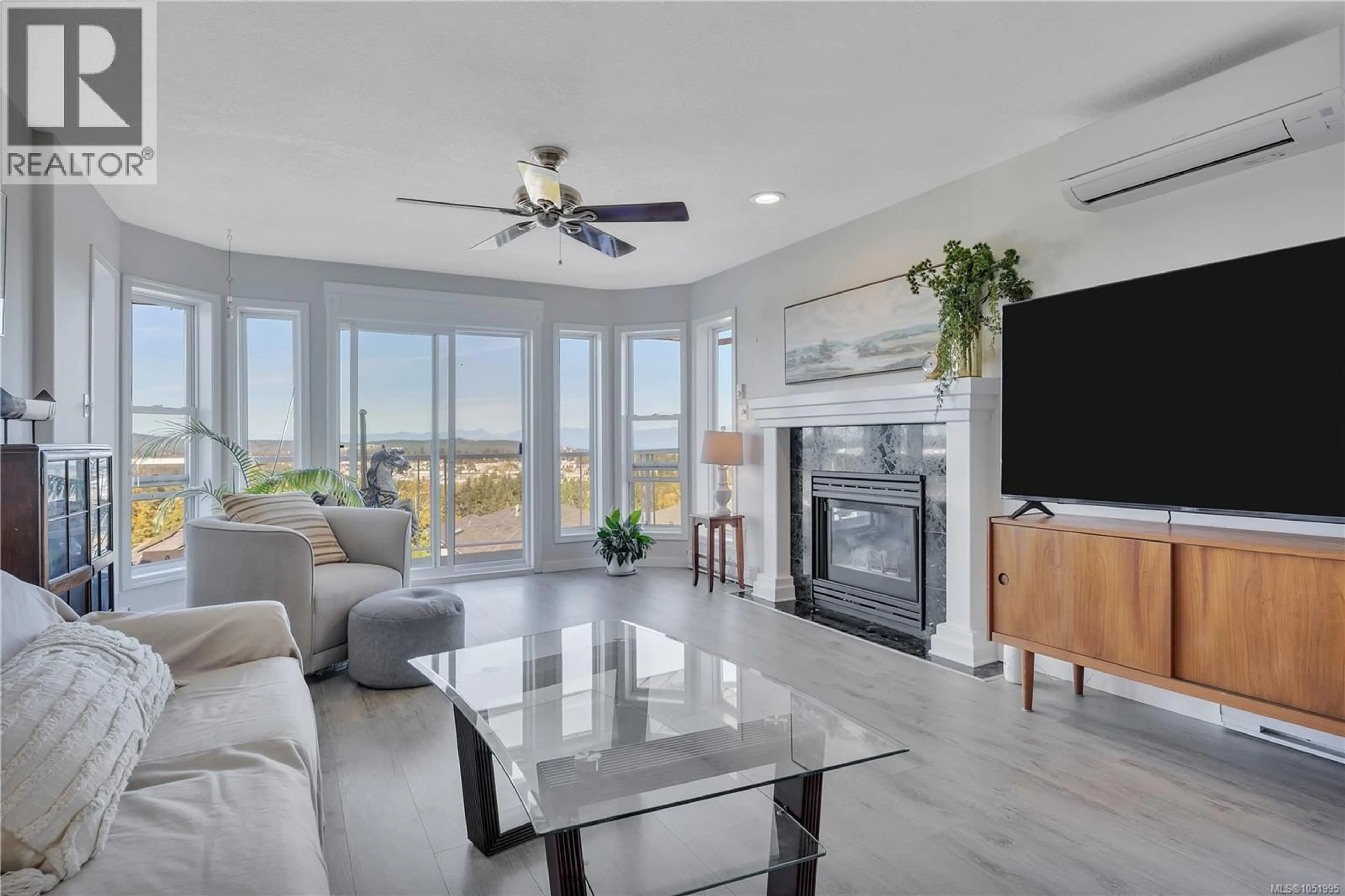Living room with furniture, ceramic/tile floor for 2145 WOODTHRUSH PLACE, Nanaimo British Columbia V9R6V3