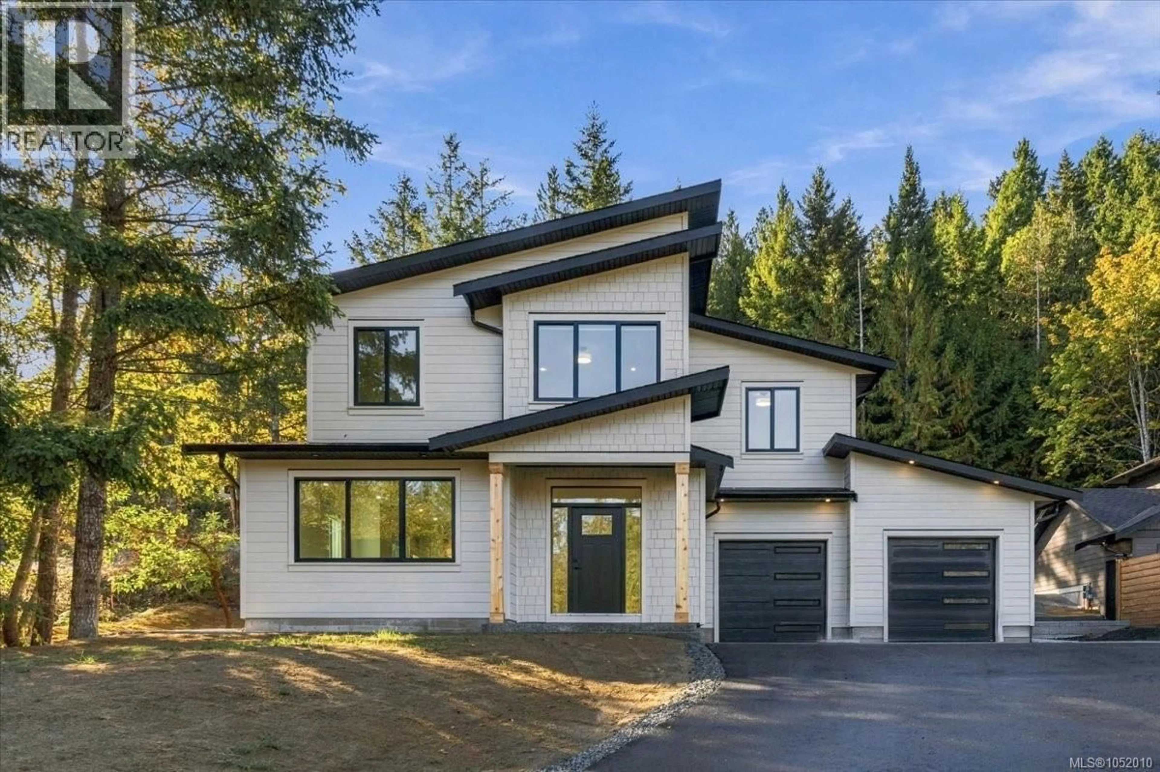 Home with brick exterior material, street for 8015 RIDGE ROAD, Lantzville British Columbia V0R2H0