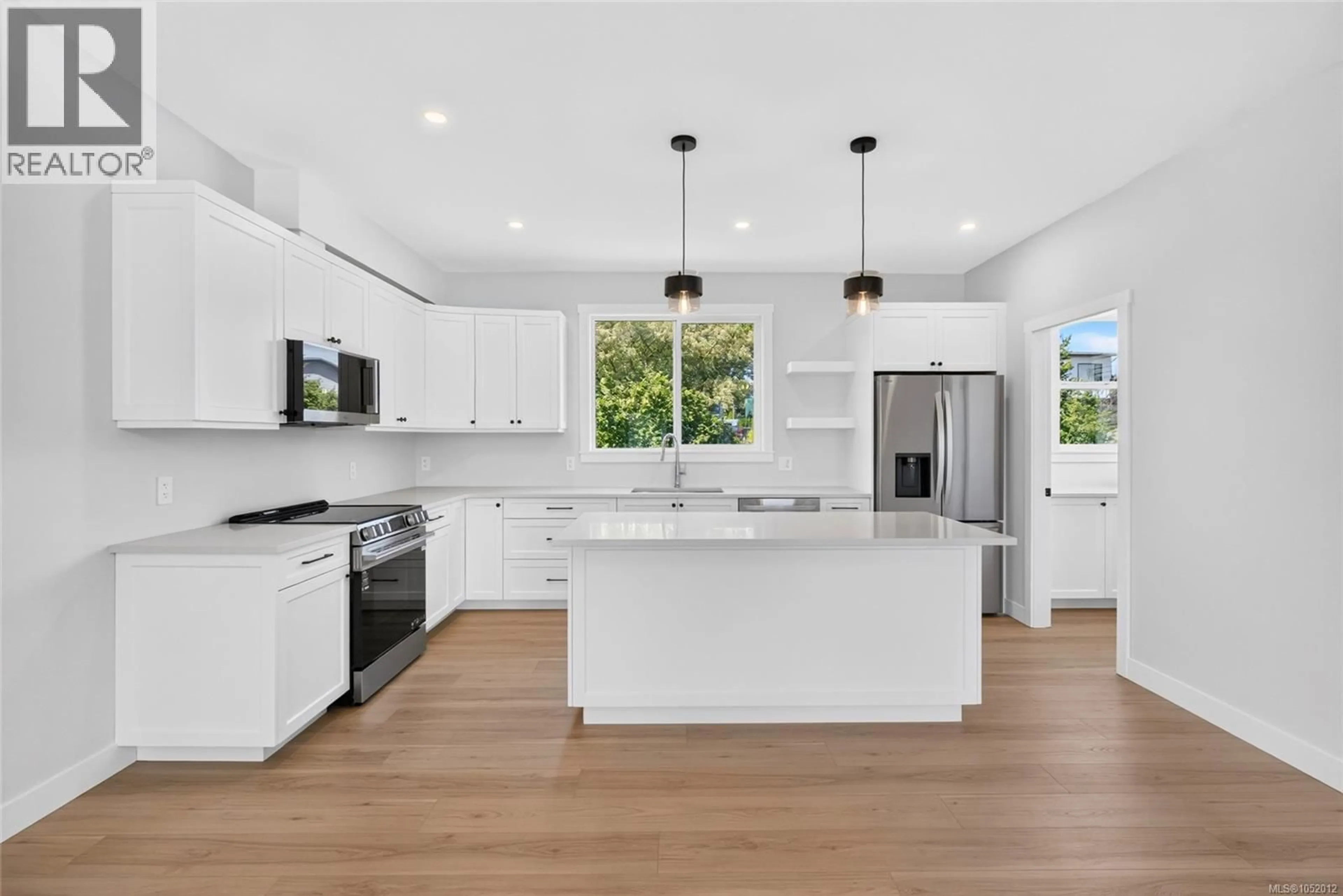 Open concept kitchen, ceramic/tile floor for 2022B GALERNO ROAD, Campbell River British Columbia V9W0A2