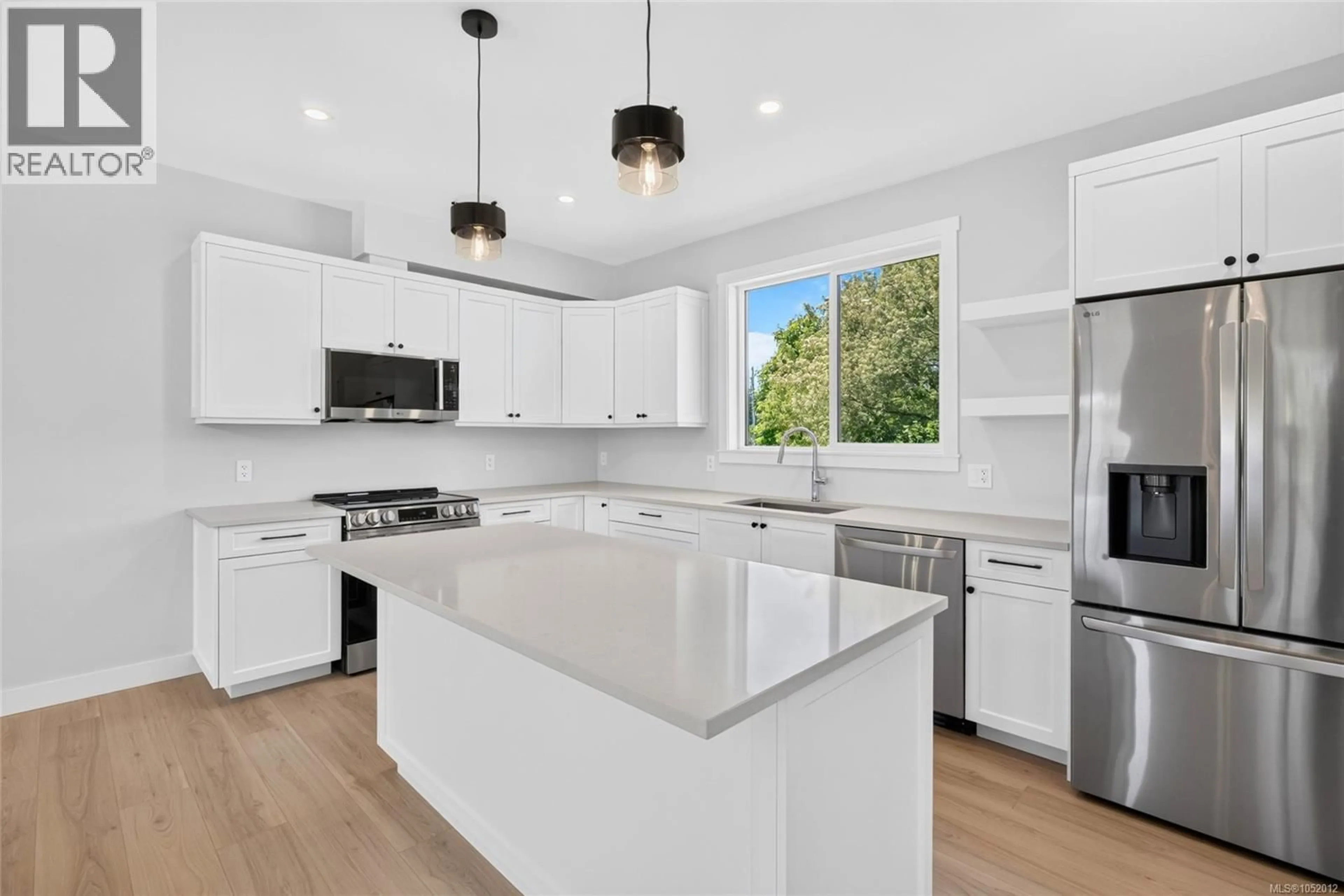 Open concept kitchen, ceramic/tile floor for 2022B GALERNO ROAD, Campbell River British Columbia V9W0A2