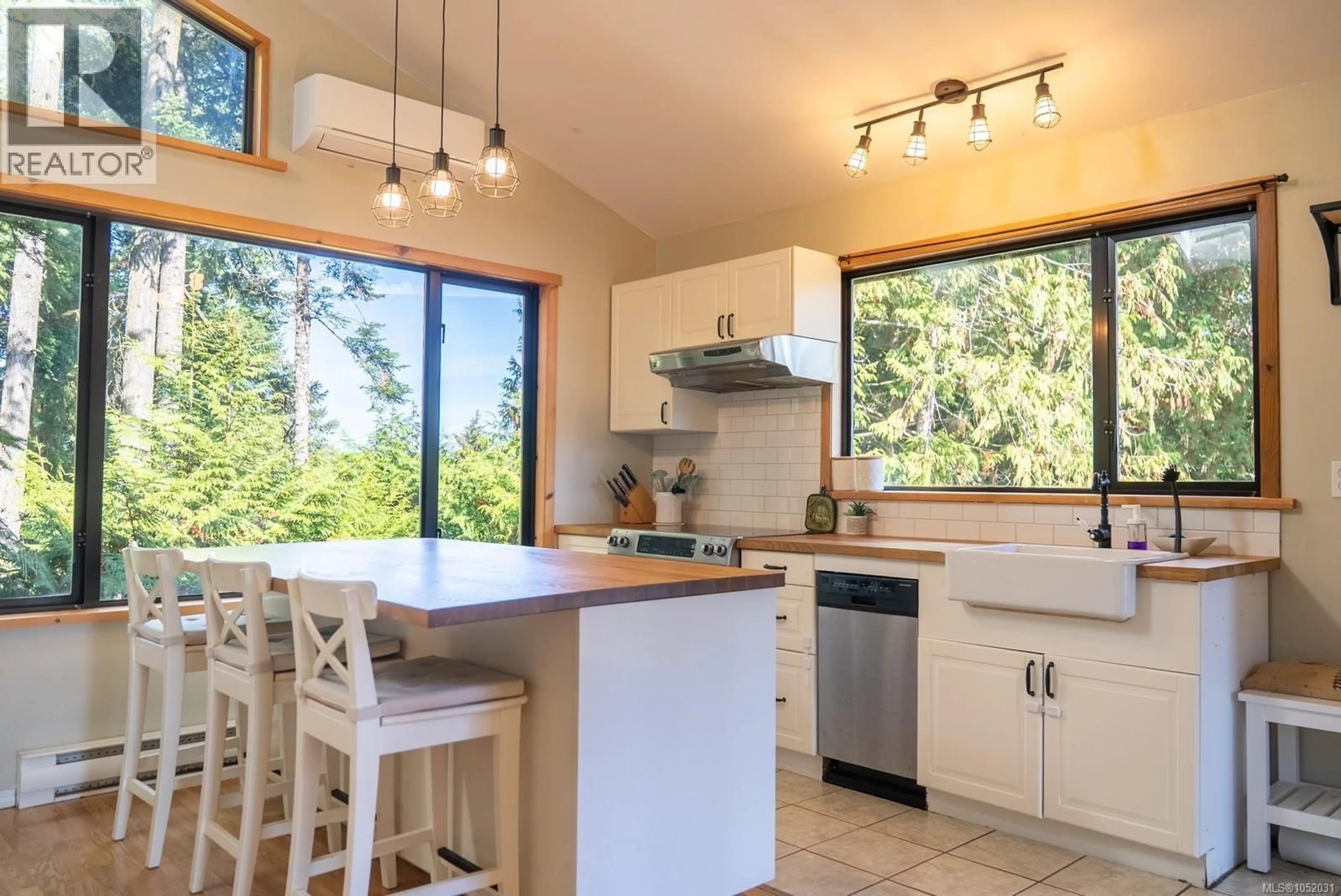 Open concept kitchen, ceramic/tile floor for 4318 PORT WASHINGTON ROAD, Pender Island British Columbia V0N2M1
