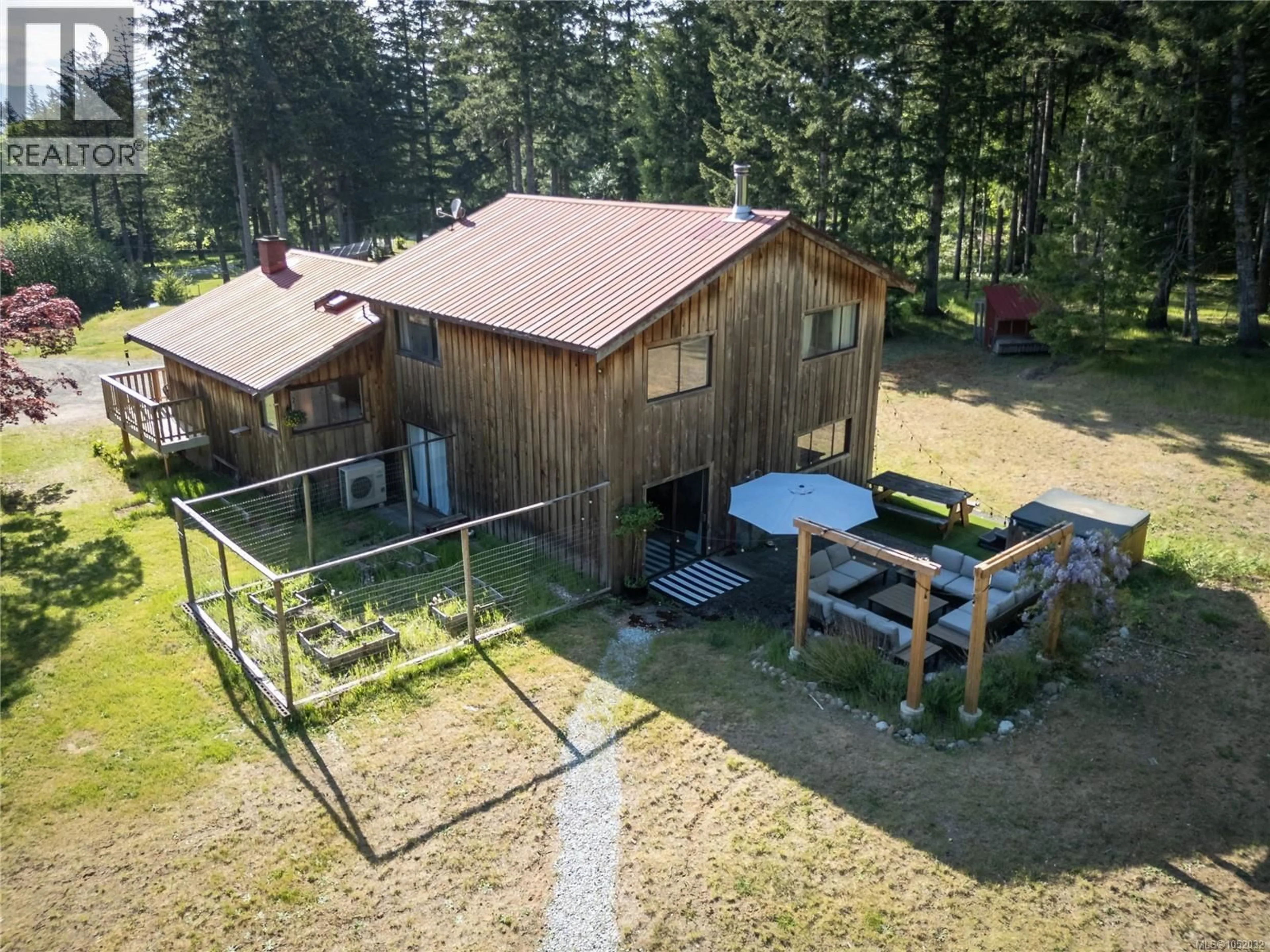A pic from outside/outdoor area/front of a property/back of a property/a pic from drone, unknown for 2279/2281 CLARK ROAD, Courtenay British Columbia V9J1T1