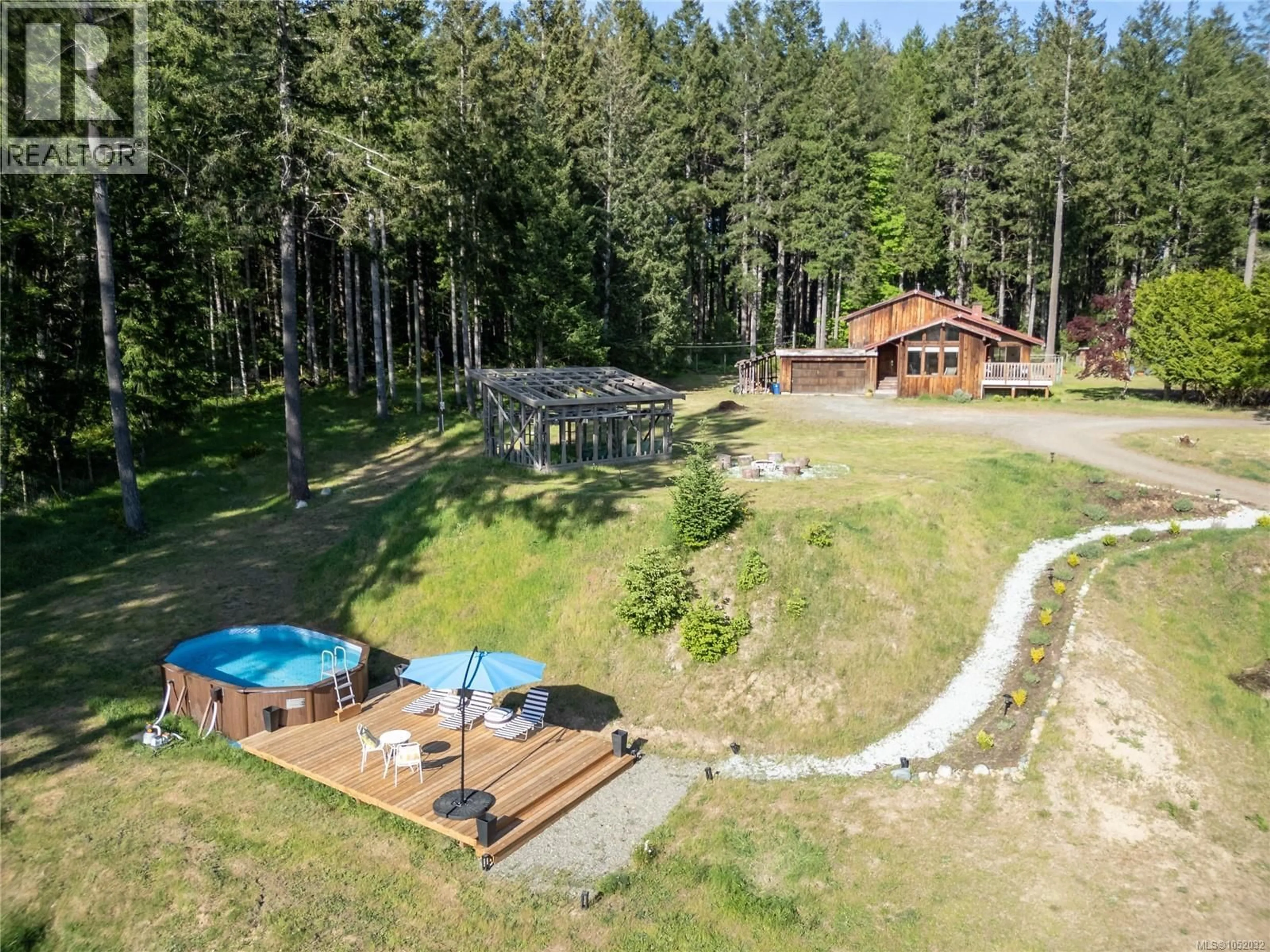 A pic from outside/outdoor area/front of a property/back of a property/a pic from drone, forest/trees view for 2279/2281 CLARK ROAD, Courtenay British Columbia V9J1T1