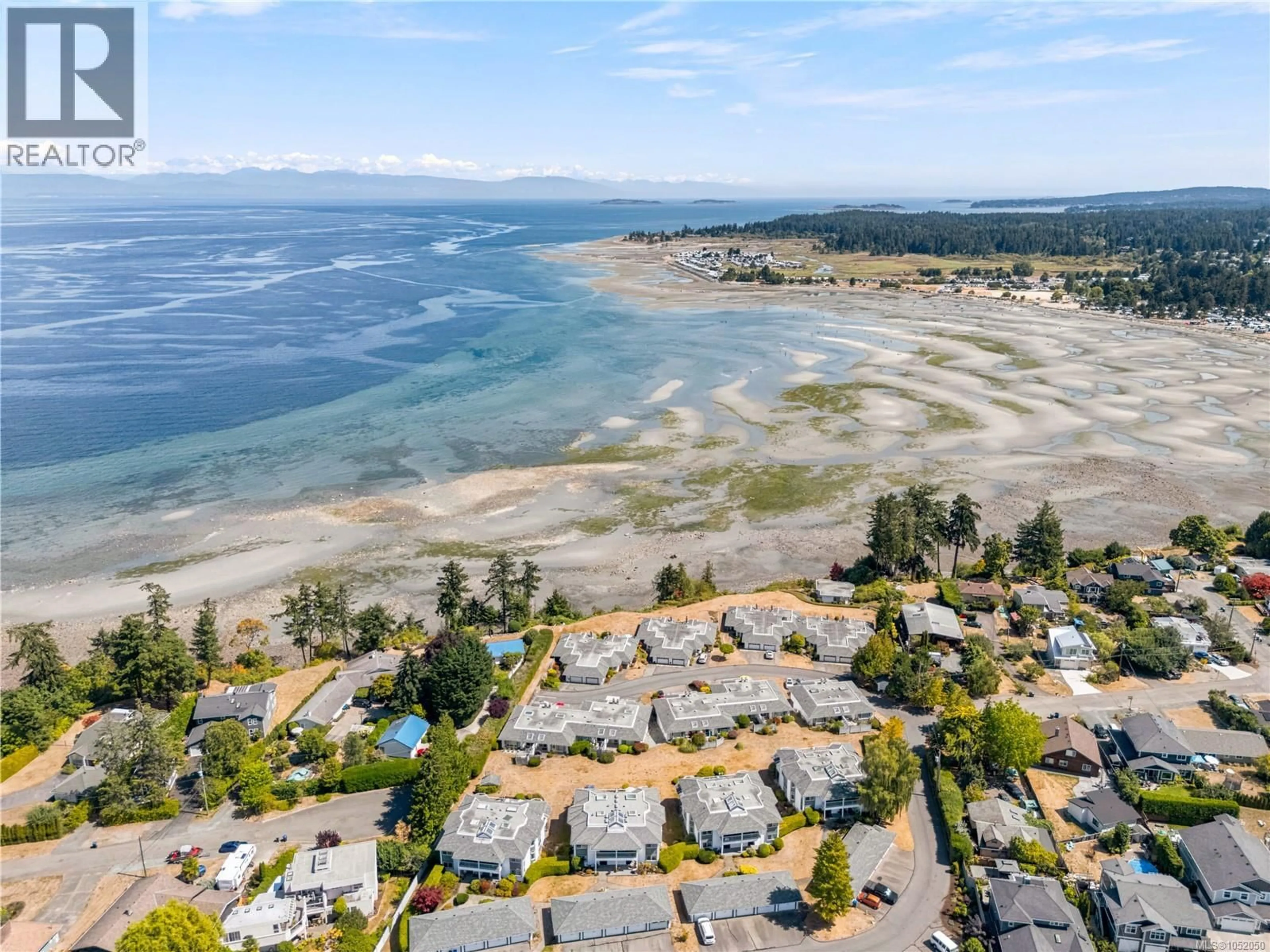A pic from outside/outdoor area/front of a property/back of a property/a pic from drone, water/lake/river/ocean view for 228 - 330 DOGWOOD STREET, Parksville British Columbia V9P1P7