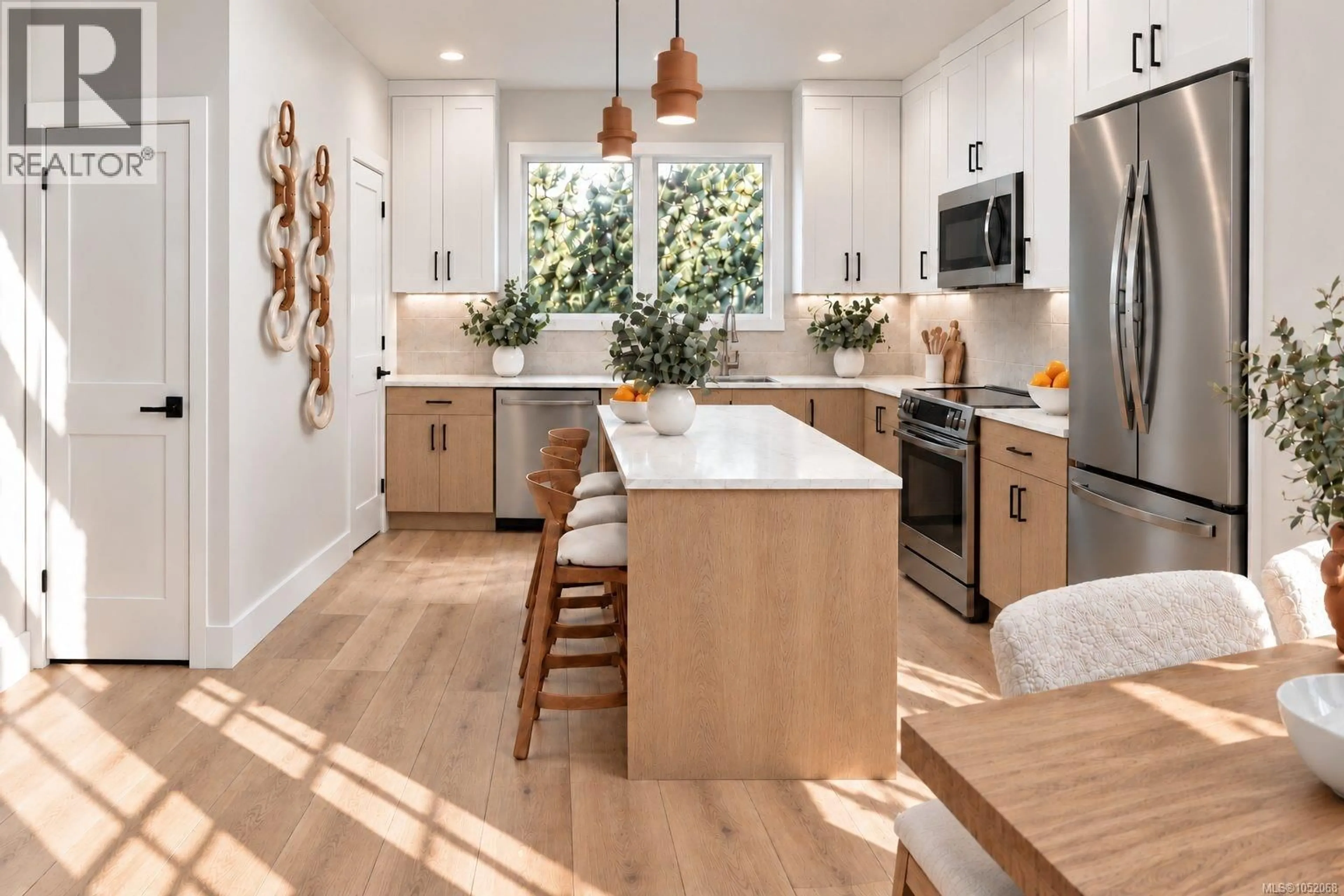 Open concept kitchen, wood/laminate floor for 112 - 2840 KNOTTY PINE ROAD, Langford British Columbia V9B2T9