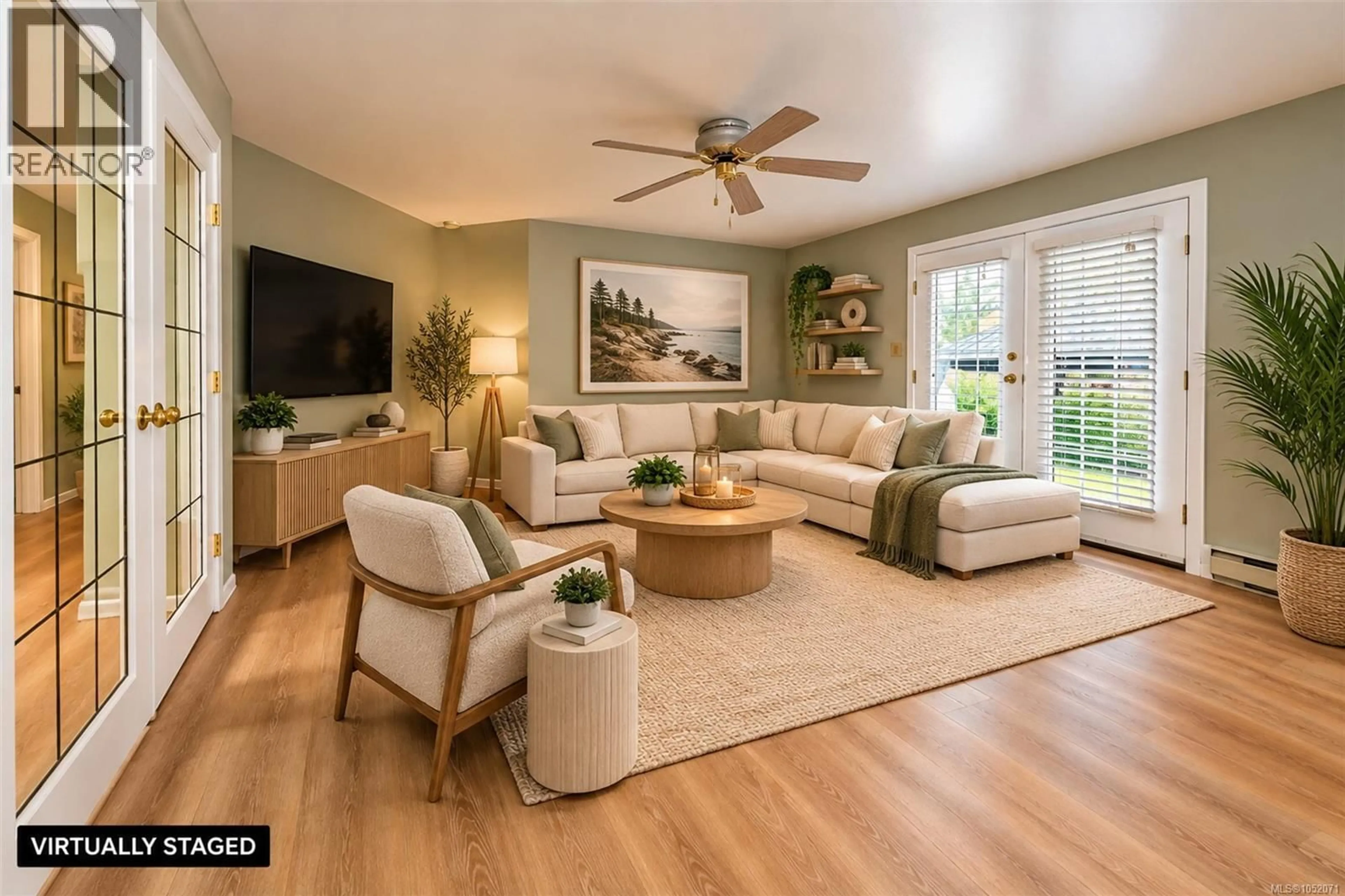 Living room with furniture, wood/laminate floor for 17 - 6766 CENTRAL SAANICH ROAD, Central Saanich British Columbia V8Z7E1