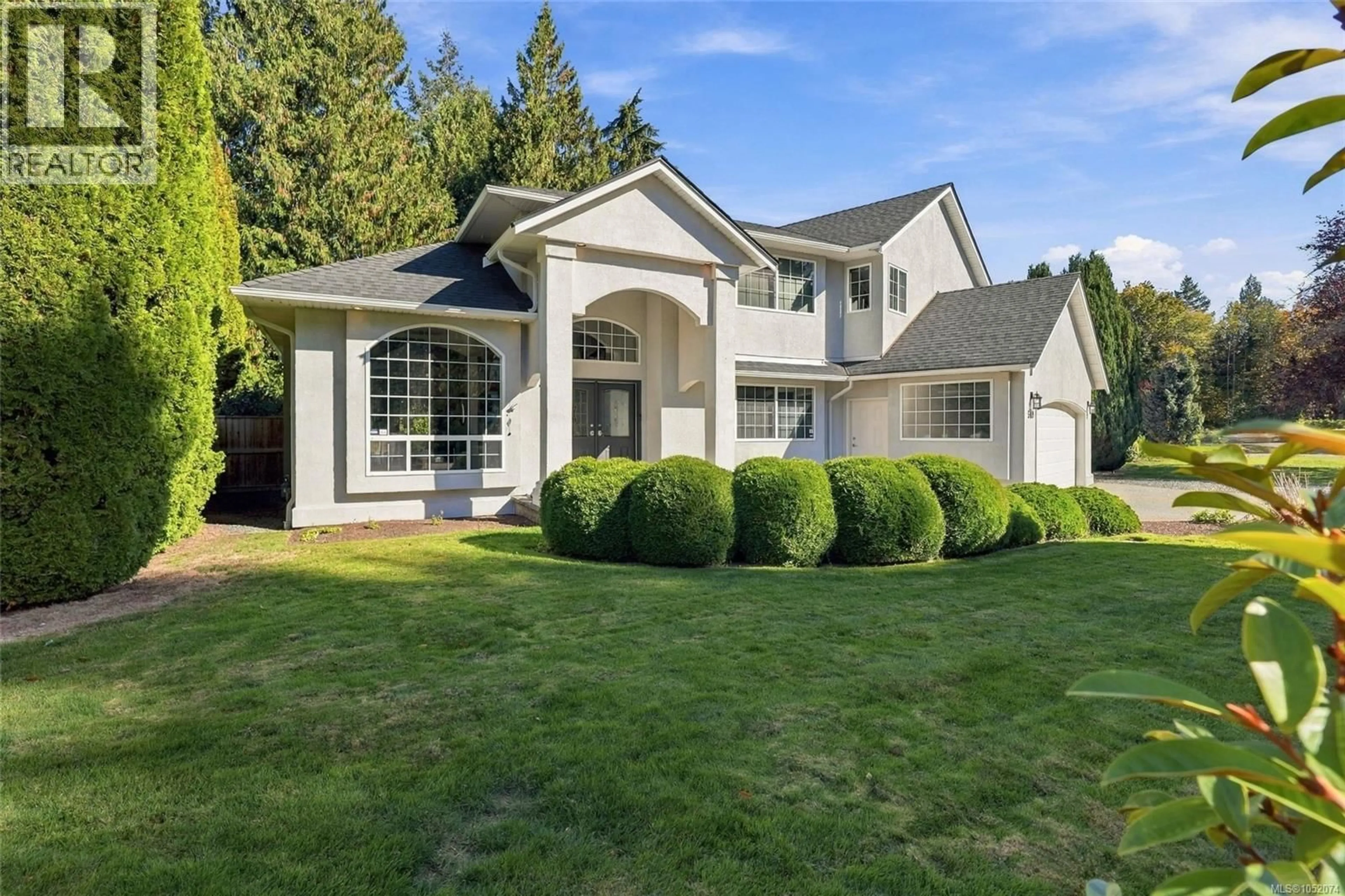 Home with vinyl exterior material, street for 589 BELYEA ROAD, Qualicum Beach British Columbia V9K1H3