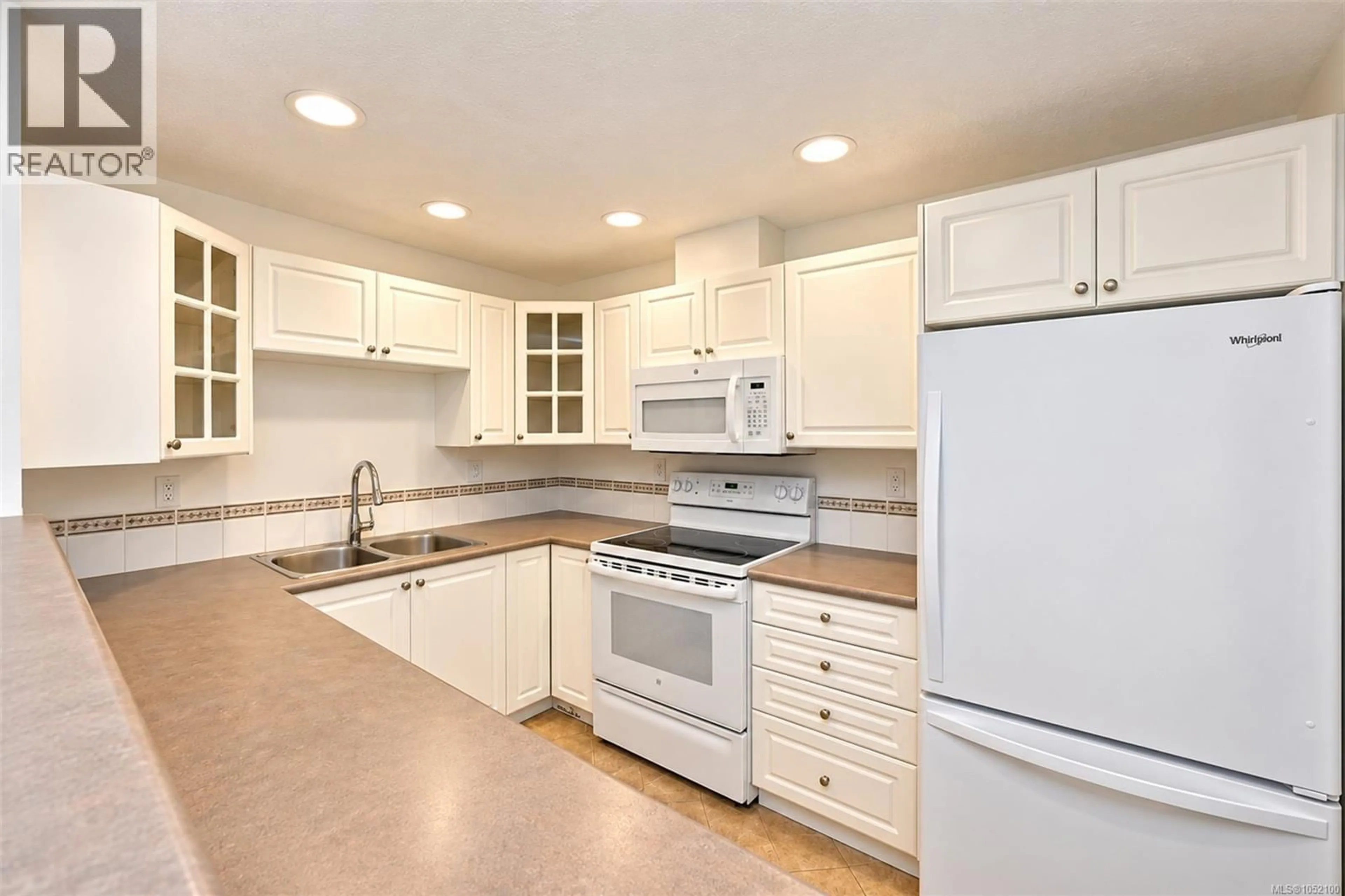 Standard kitchen, ceramic/tile floor for 109 - 380 WATERFRONT CRESCENT, Victoria British Columbia V8T5K3