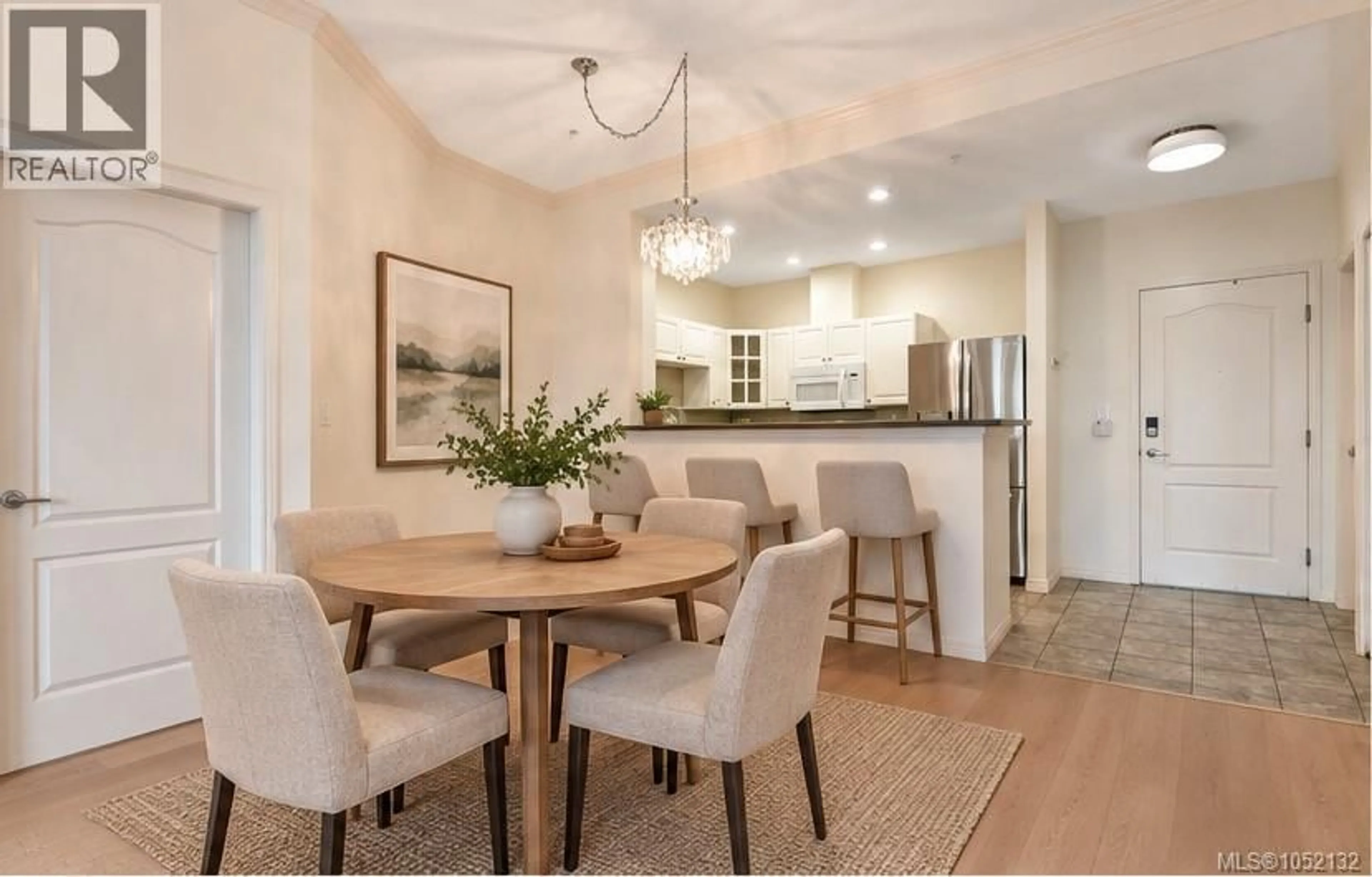 Dining room, wood/laminate floor for 409 - 380 WATERFRONT CRESCENT, Victoria British Columbia V8T5K3