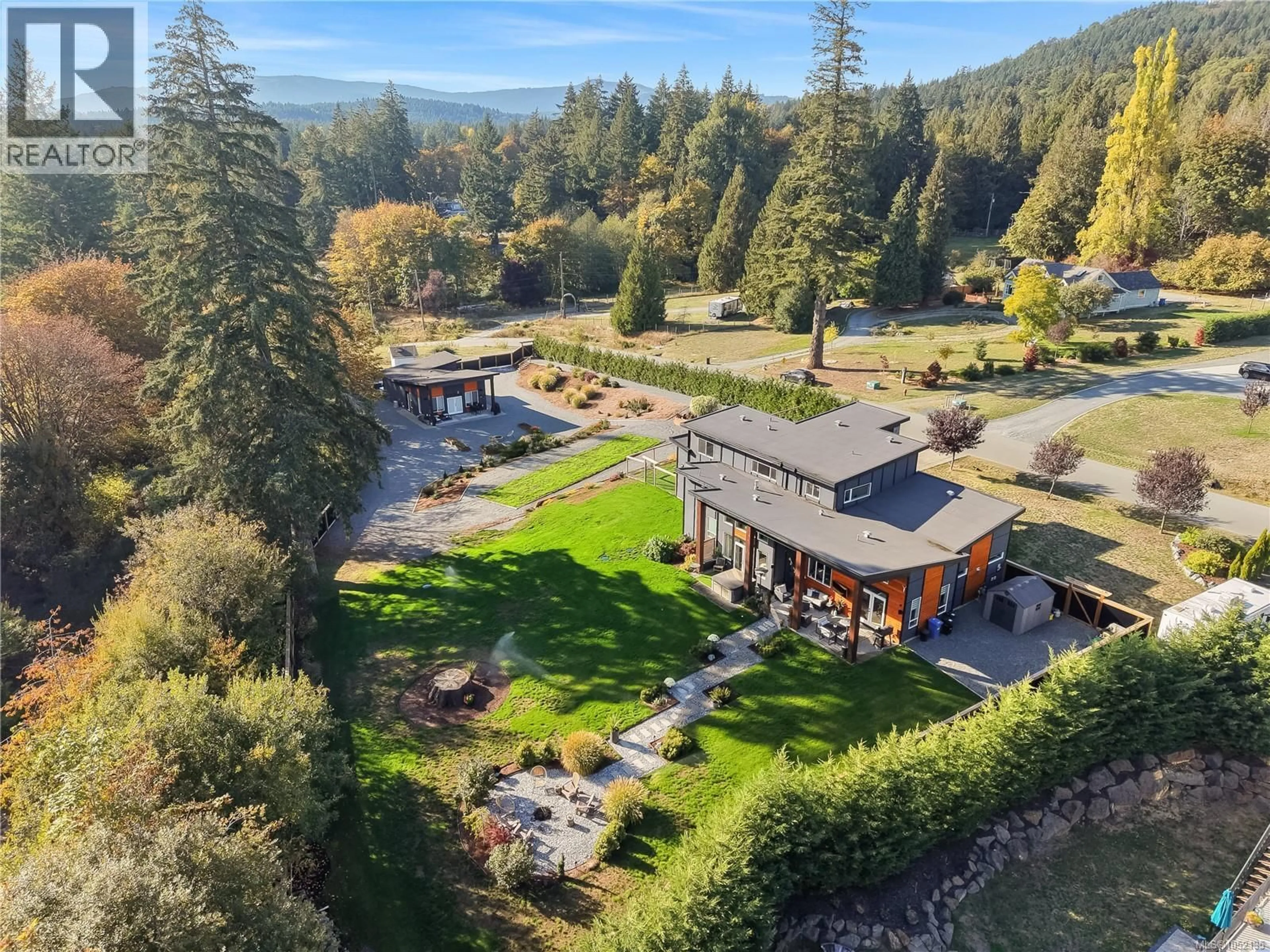 A pic from outside/outdoor area/front of a property/back of a property/a pic from drone, mountain view for 3205 PINDER PLACE, Shawnigan Lake British Columbia V0R1L6