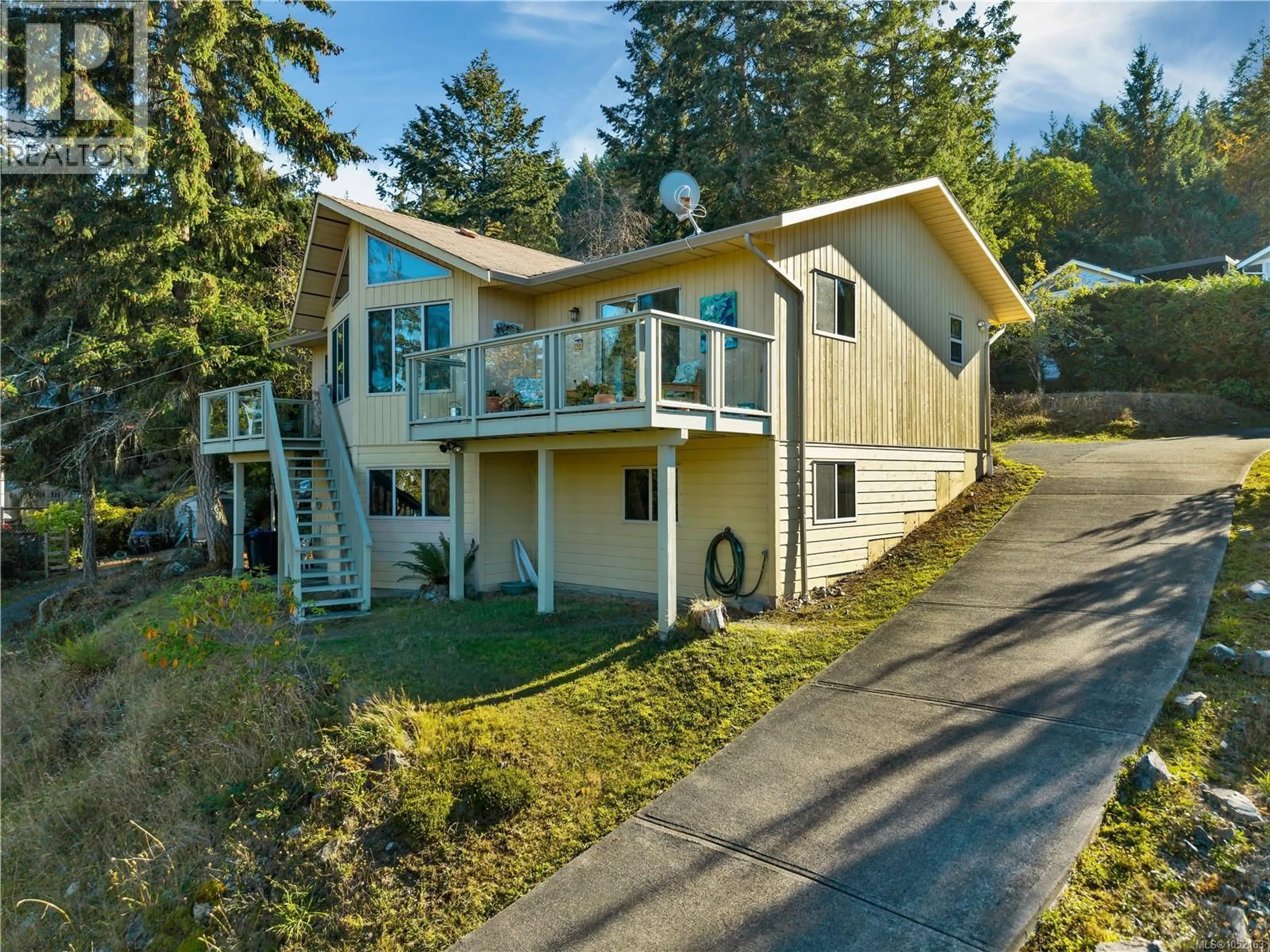 Home with vinyl exterior material, street for 3122 DOLPHIN DRIVE, Nanoose Bay British Columbia