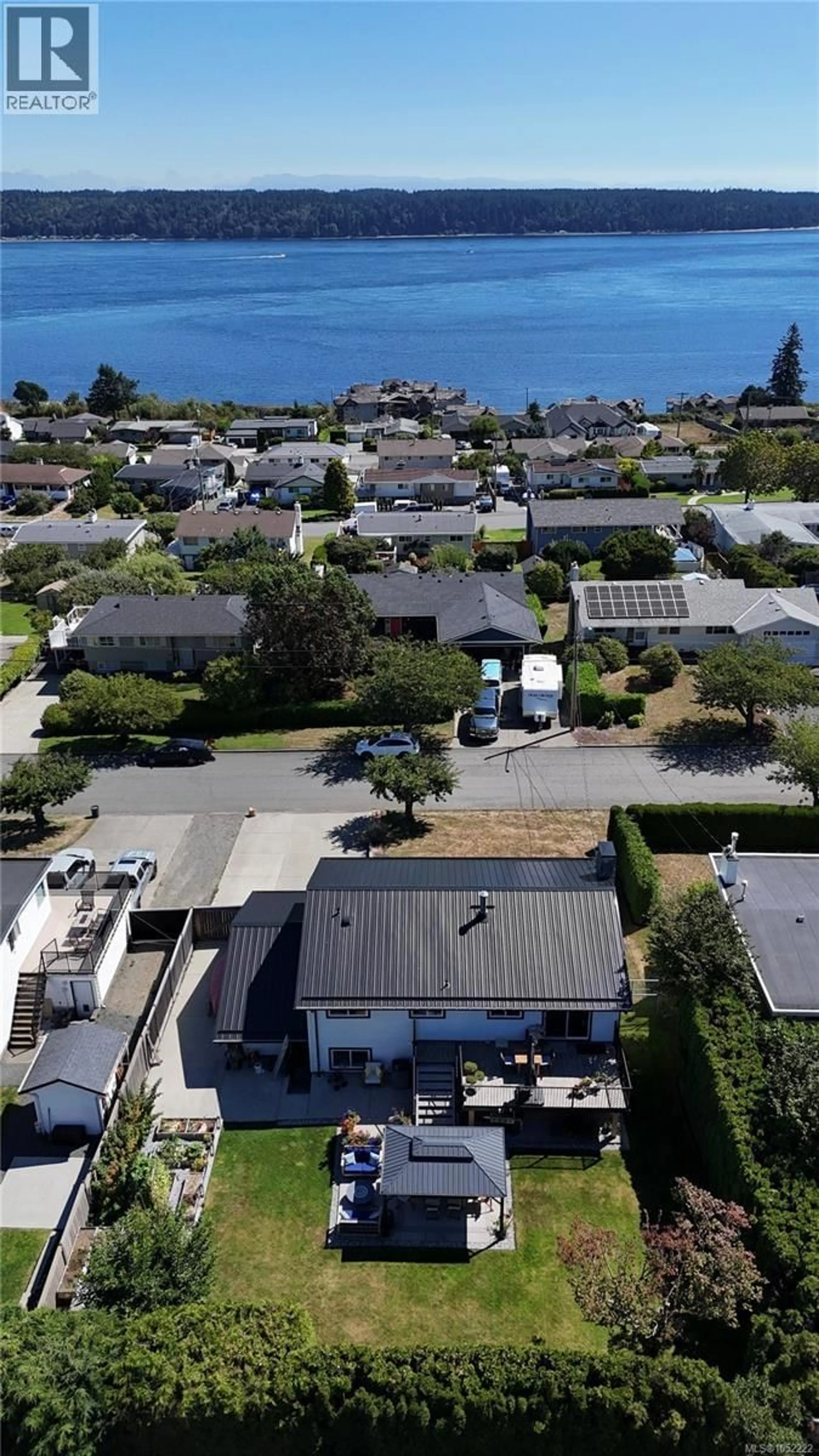 A pic from outside/outdoor area/front of a property/back of a property/a pic from drone, water/lake/river/ocean view for 34 MCLEAN STREET, Campbell River British Columbia V9W2L9