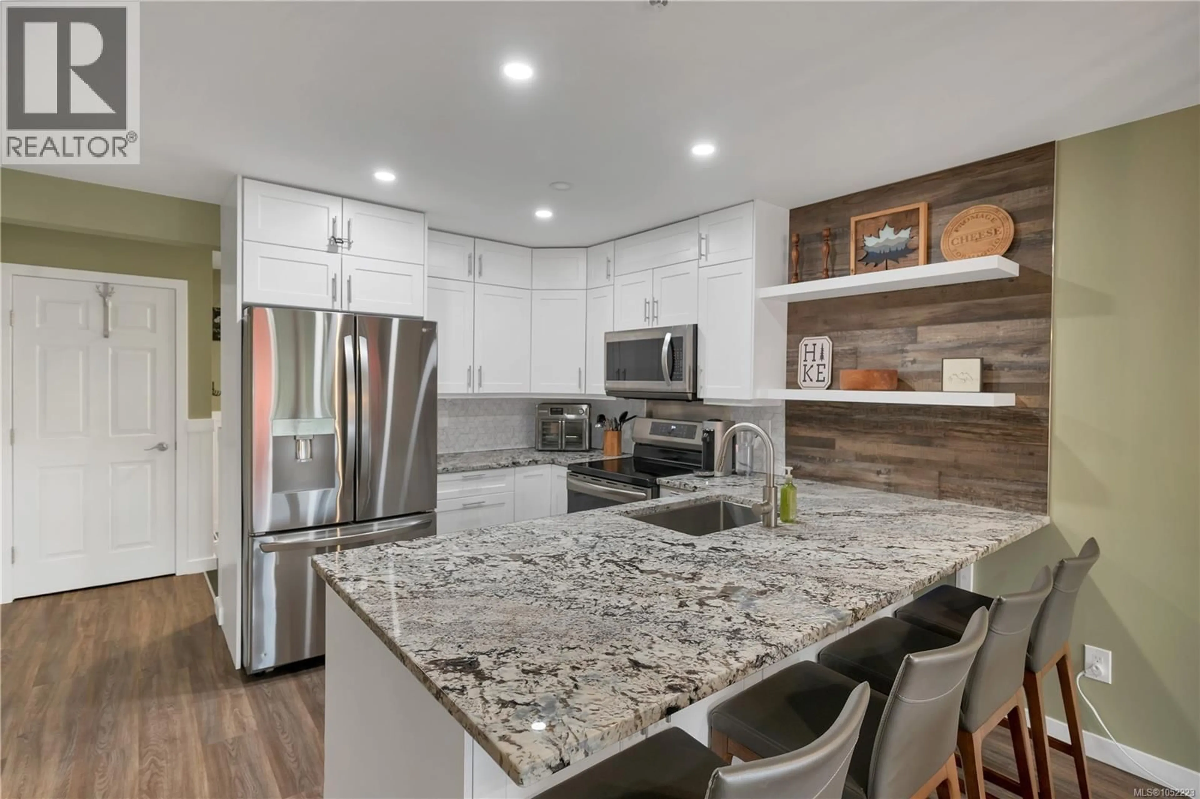 Open concept kitchen, ceramic/tile floor for 506 - 1201 HENRY ROAD, Courtenay British Columbia V9J1L0