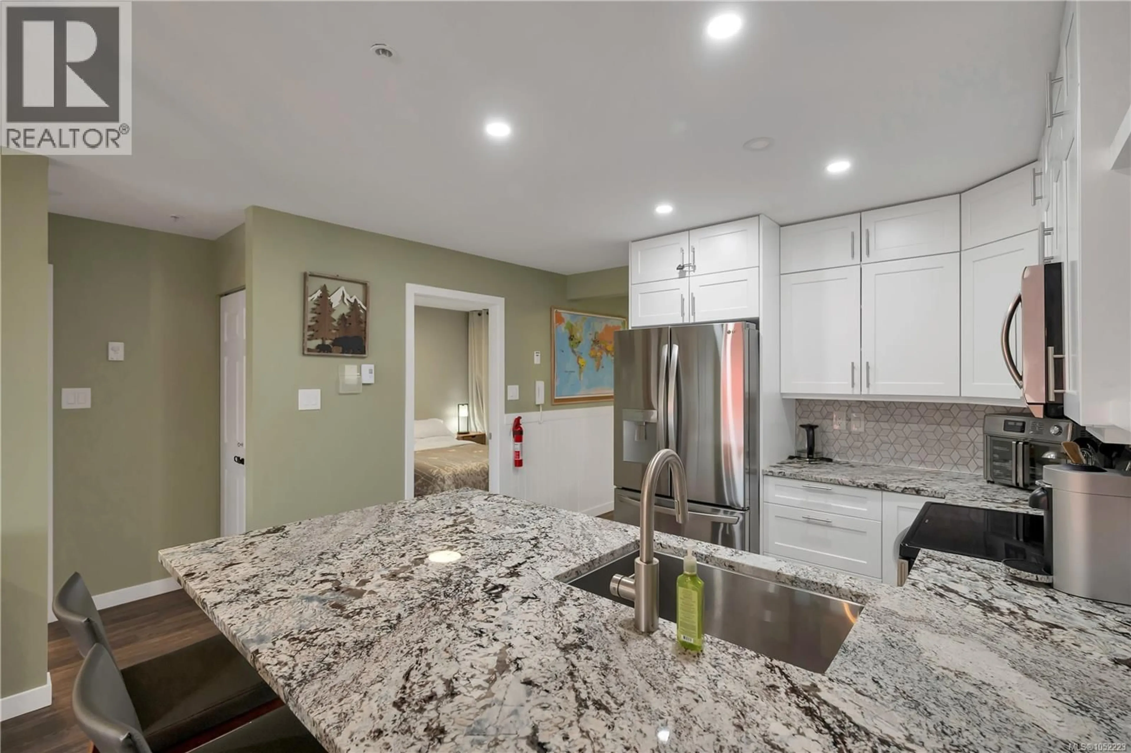 Open concept kitchen, ceramic/tile floor for 506 - 1201 HENRY ROAD, Courtenay British Columbia V9J1L0