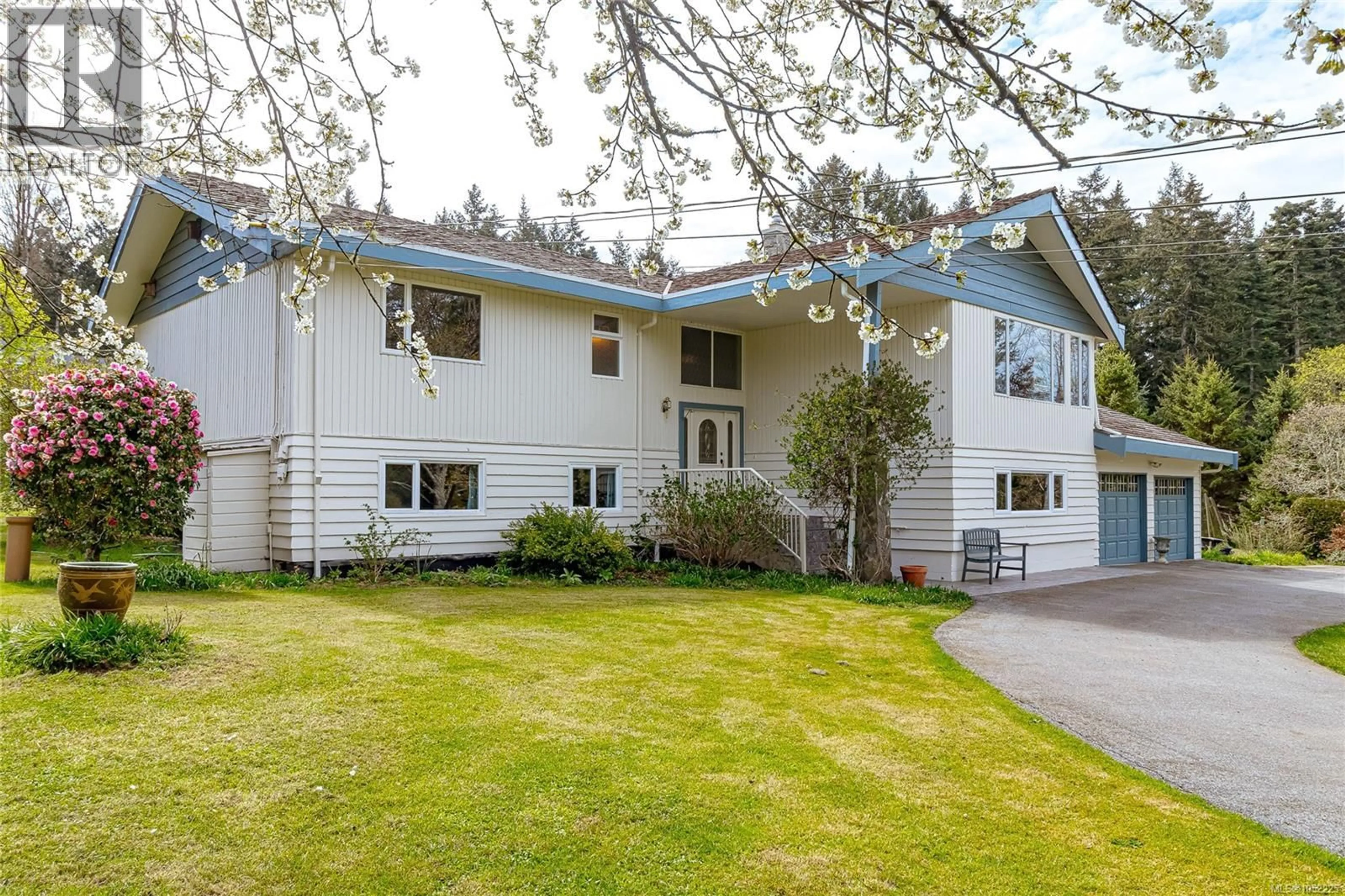 Home with vinyl exterior material, street for 9723 ARDMORE DRIVE, North Saanich British Columbia V8L5H5