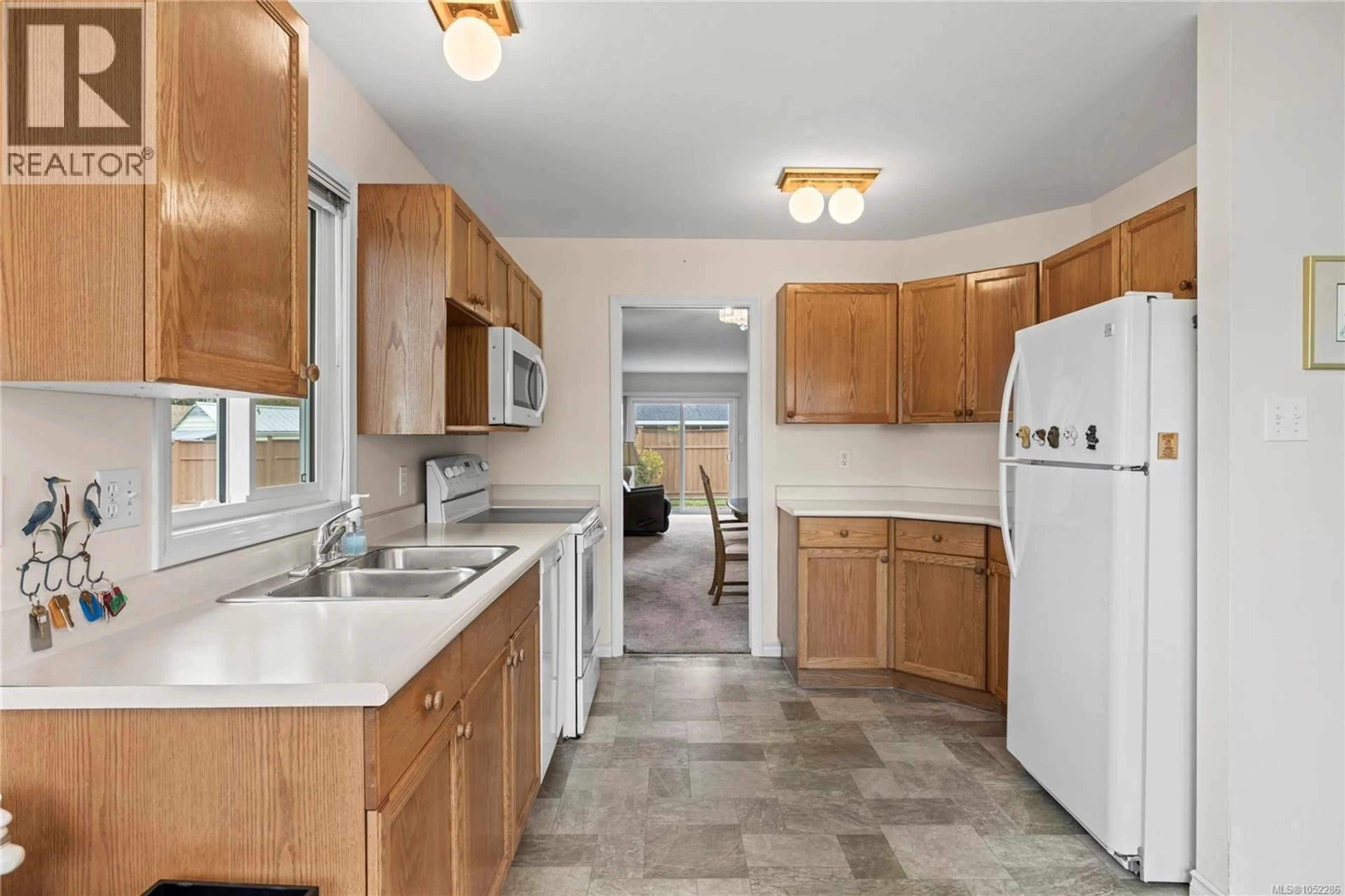 Standard kitchen, ceramic/tile floor for 113 - 240 STANFORD AVENUE EAST, Parksville British Columbia V9P2K8