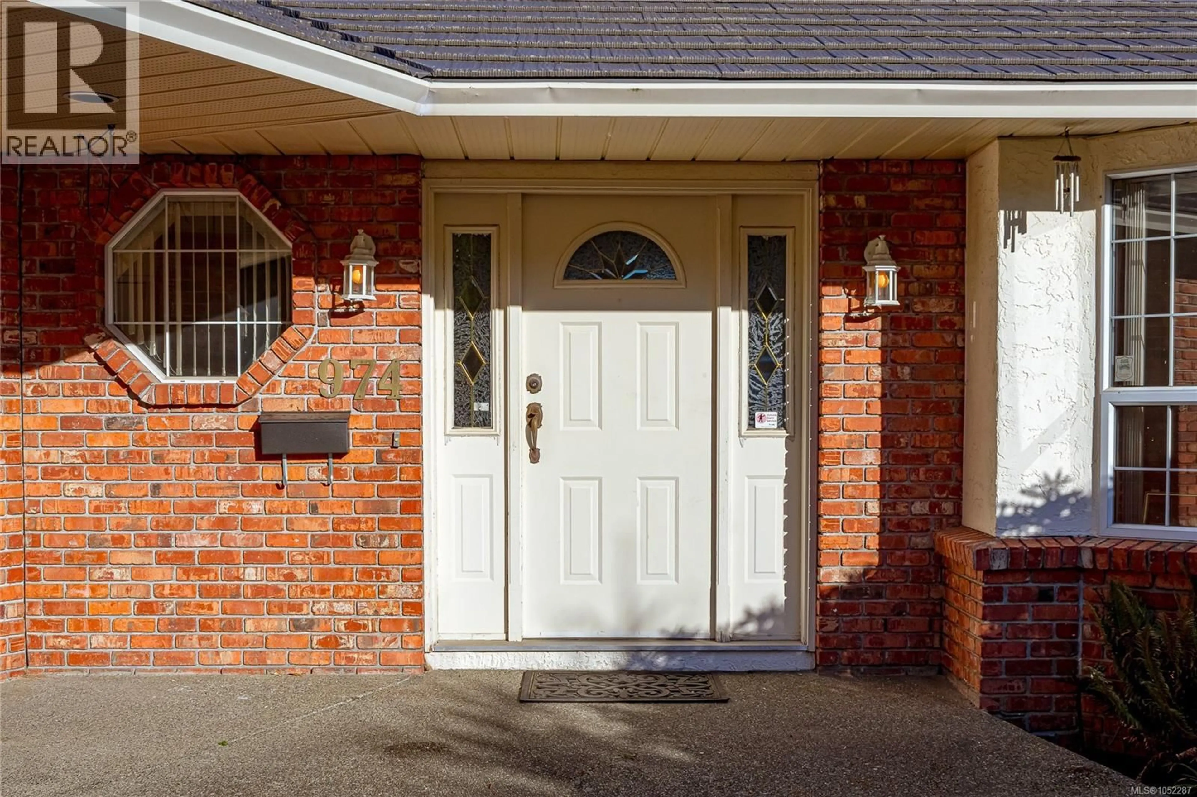 Home with brick exterior material, street for 974 SEAPEARL PLACE, Saanich British Columbia V8Y2X2