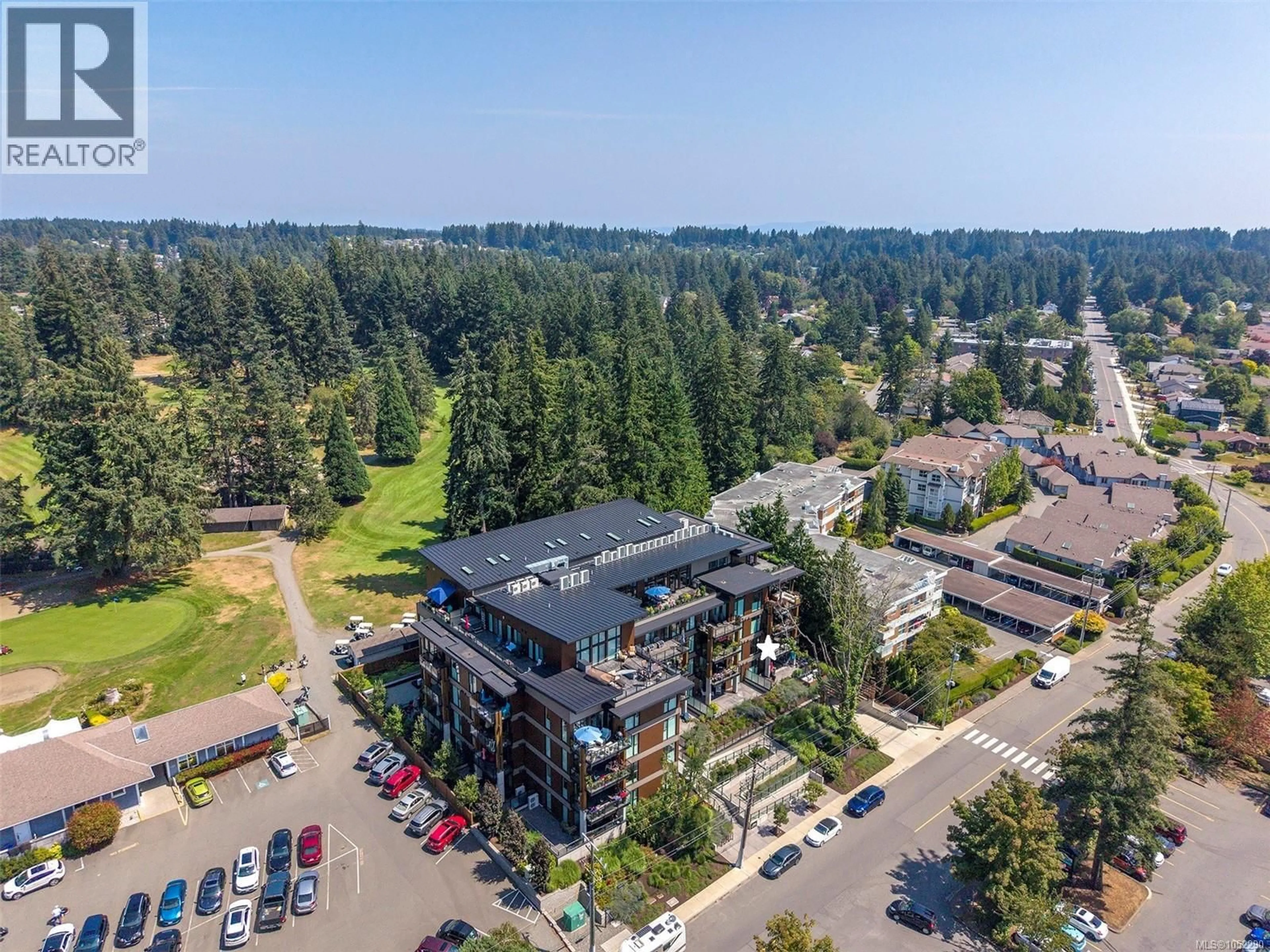 A pic from outside/outdoor area/front of a property/back of a property/a pic from drone, unknown for 208 - 1700 BALMORAL AVENUE, Comox British Columbia V9M2N1