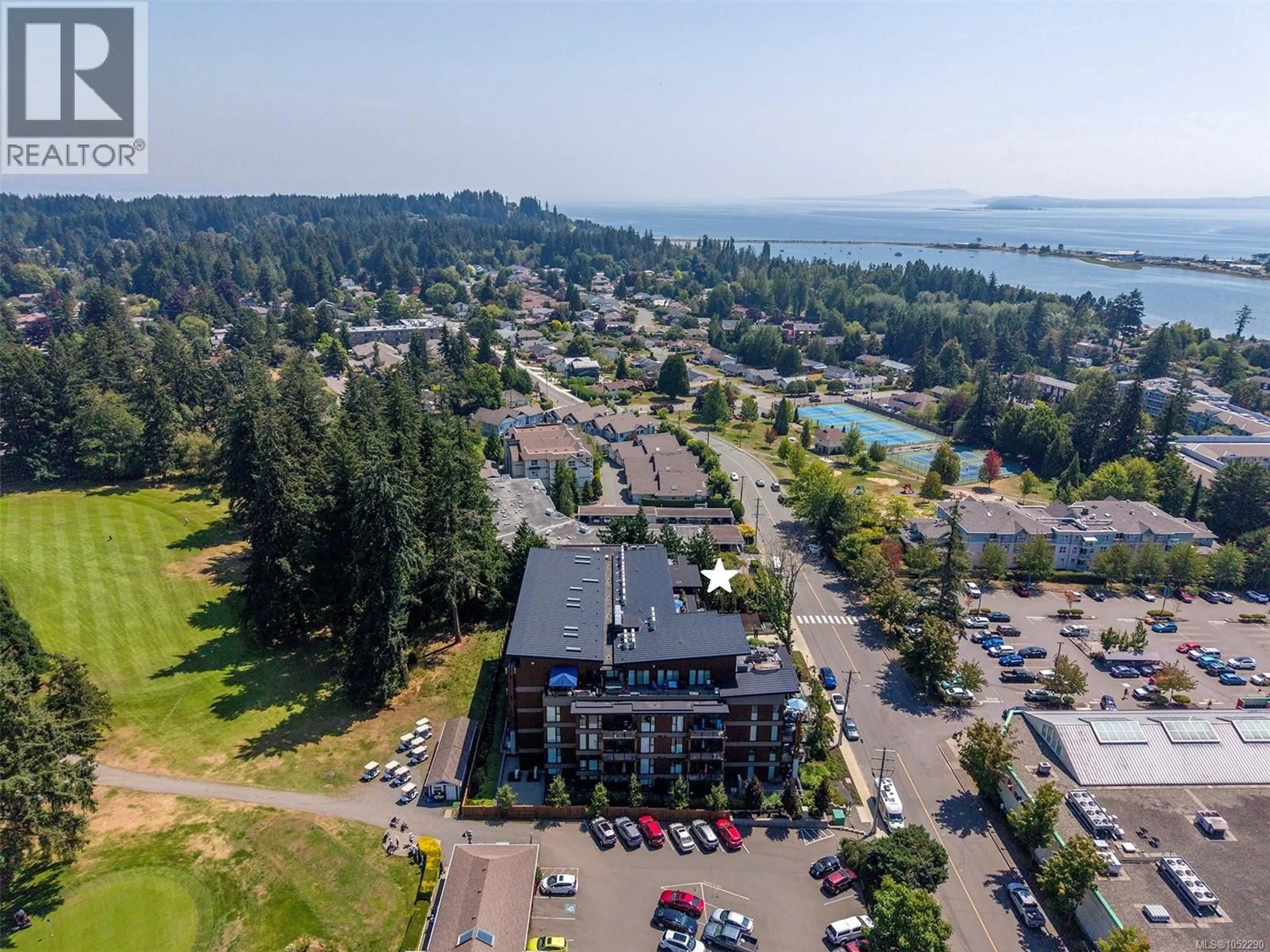 A pic from outside/outdoor area/front of a property/back of a property/a pic from drone, water/lake/river/ocean view for 208 - 1700 BALMORAL AVENUE, Comox British Columbia V9M2N1