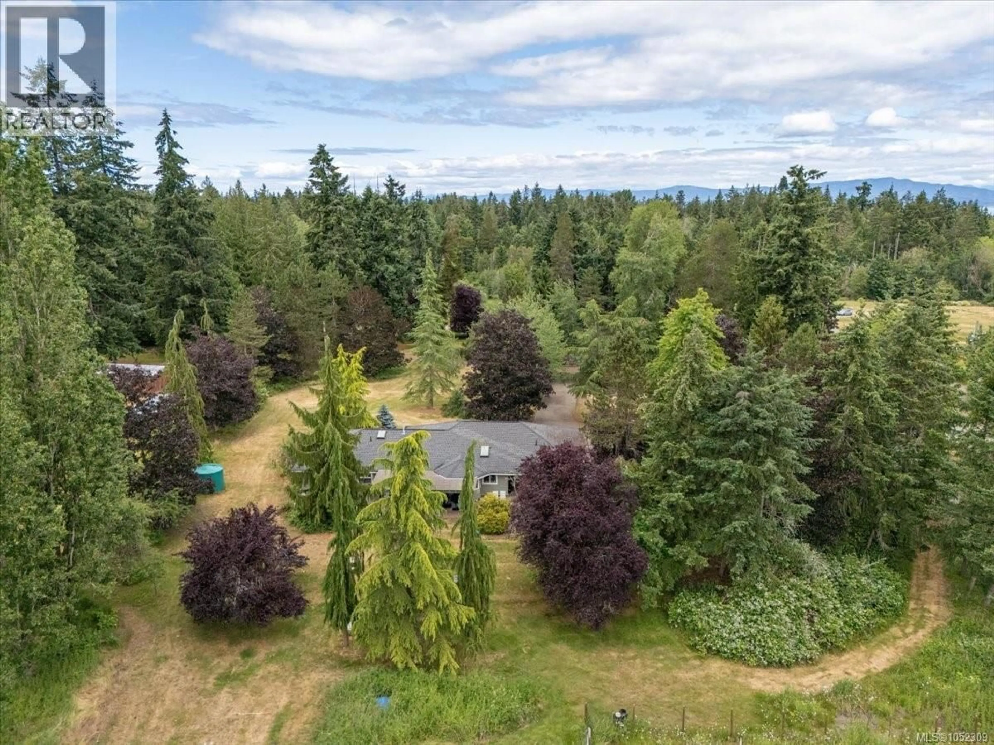 A pic from outside/outdoor area/front of a property/back of a property/a pic from drone, forest/trees view for 880 GARDEN ROAD EAST, Qualicum Beach British Columbia V9K1N2