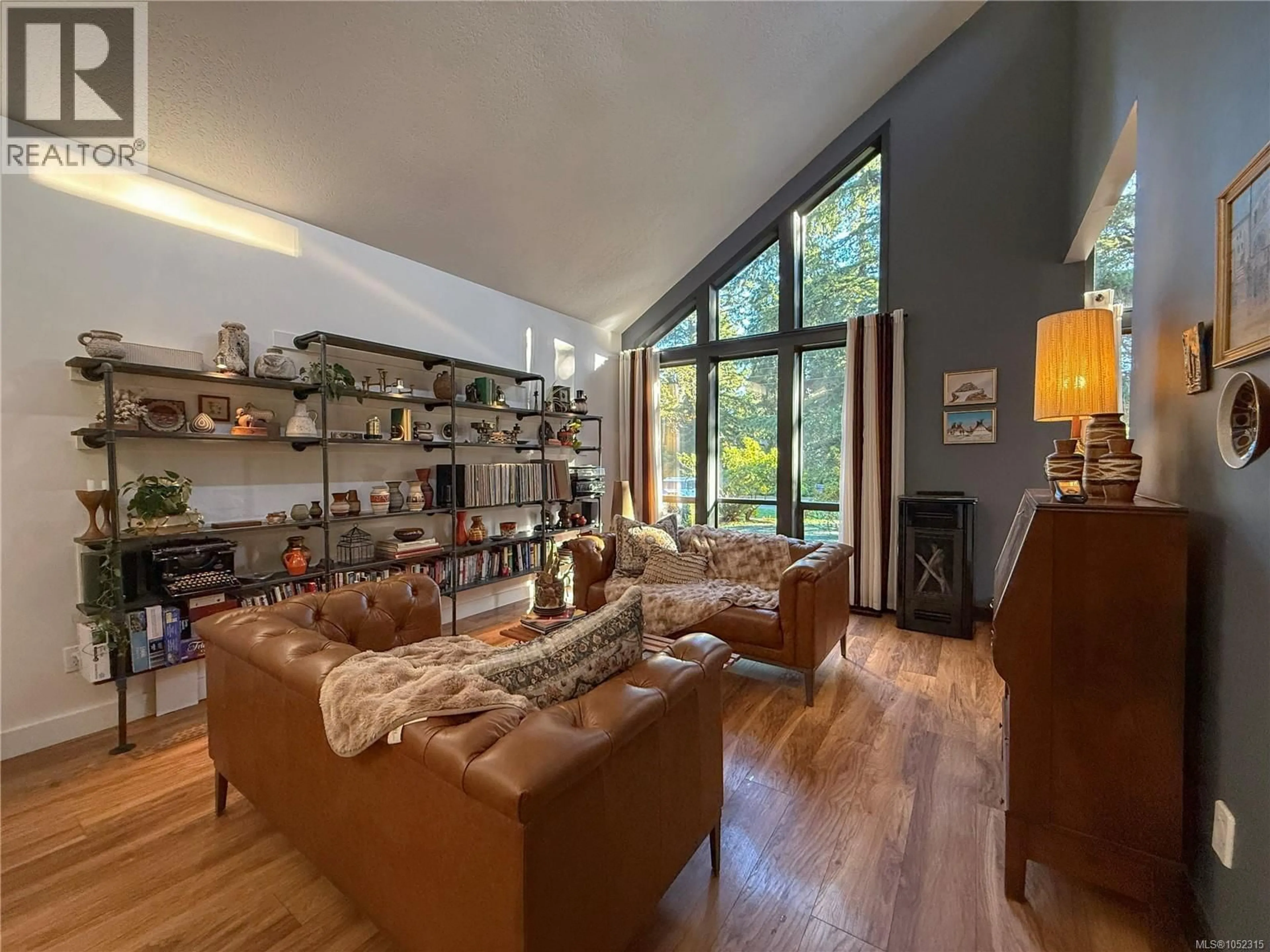Living room with furniture, unknown for 3836 SUTIL ROAD, Campbell River British Columbia V9H1J5