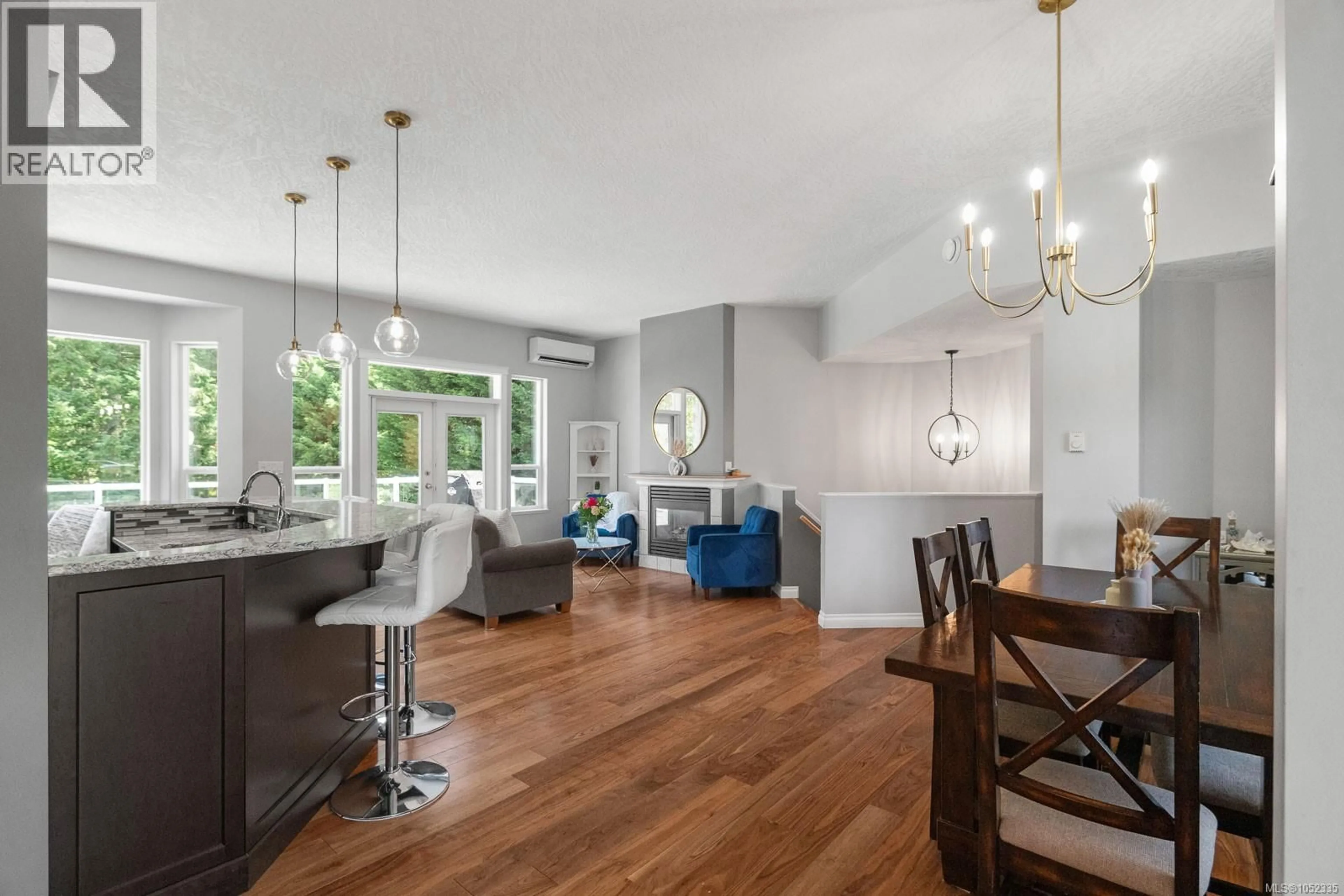 Open concept kitchen, wood/laminate floor for 1187 OSPREY DRIVE, Duncan British Columbia V9L3S3