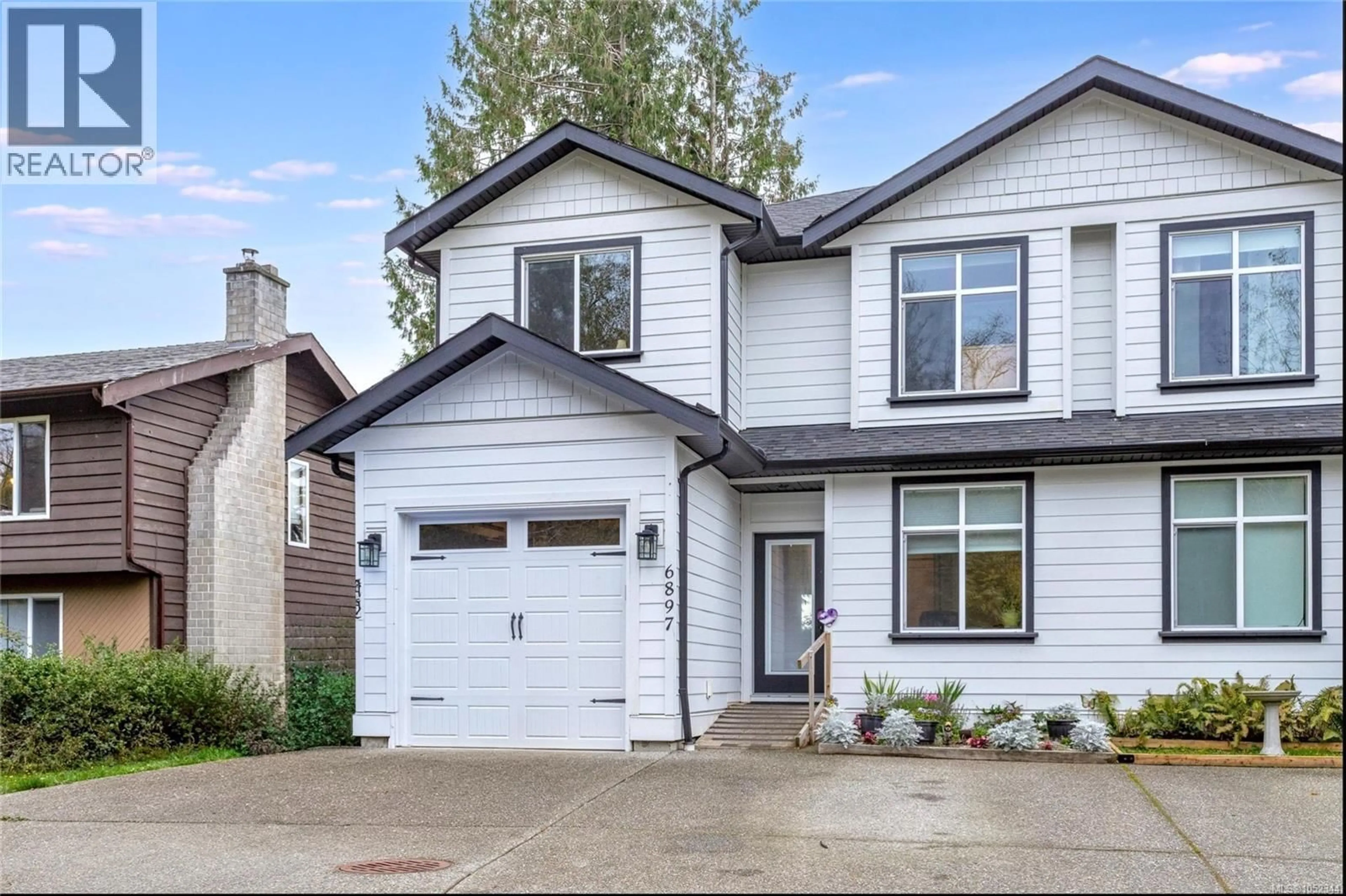 Home with vinyl exterior material, street for 6897 BEATON ROAD, Sooke British Columbia V9Z0M3