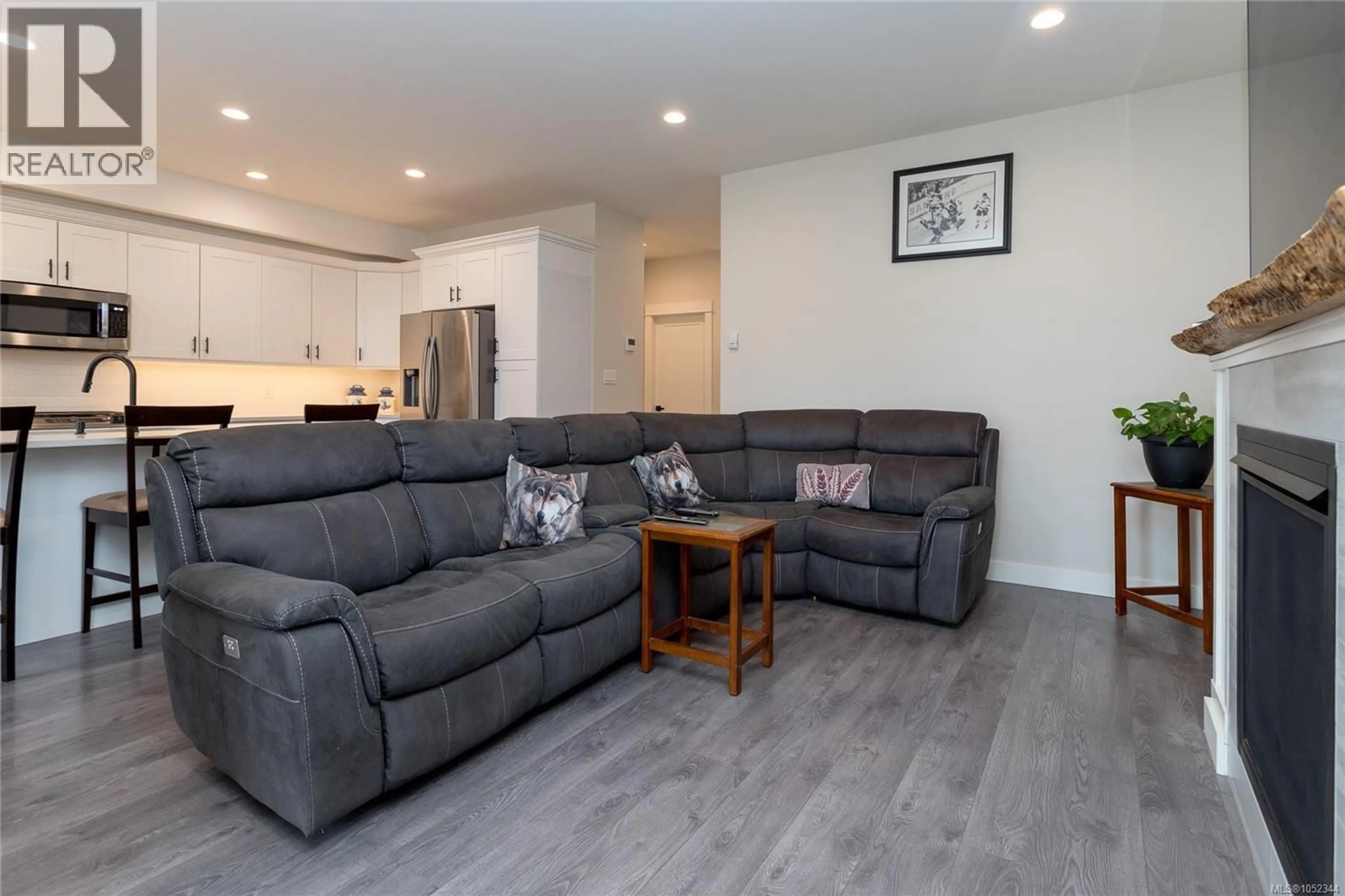 Living room with furniture, wood/laminate floor for 6897 BEATON ROAD, Sooke British Columbia V9Z0M3
