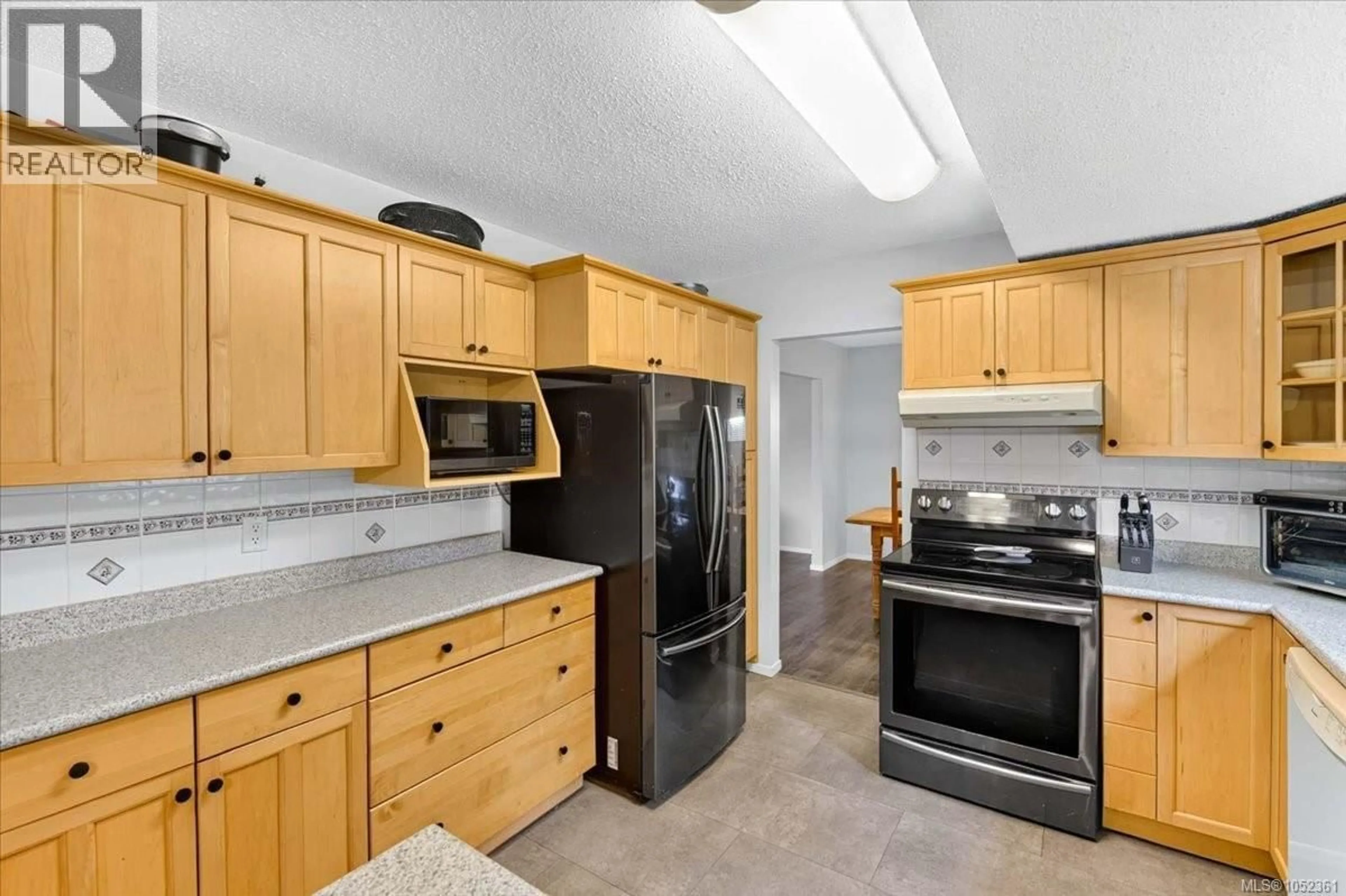 Standard kitchen, ceramic/tile floor for 5536 FALLS STREET, Port Alberni British Columbia V9Y7Y6