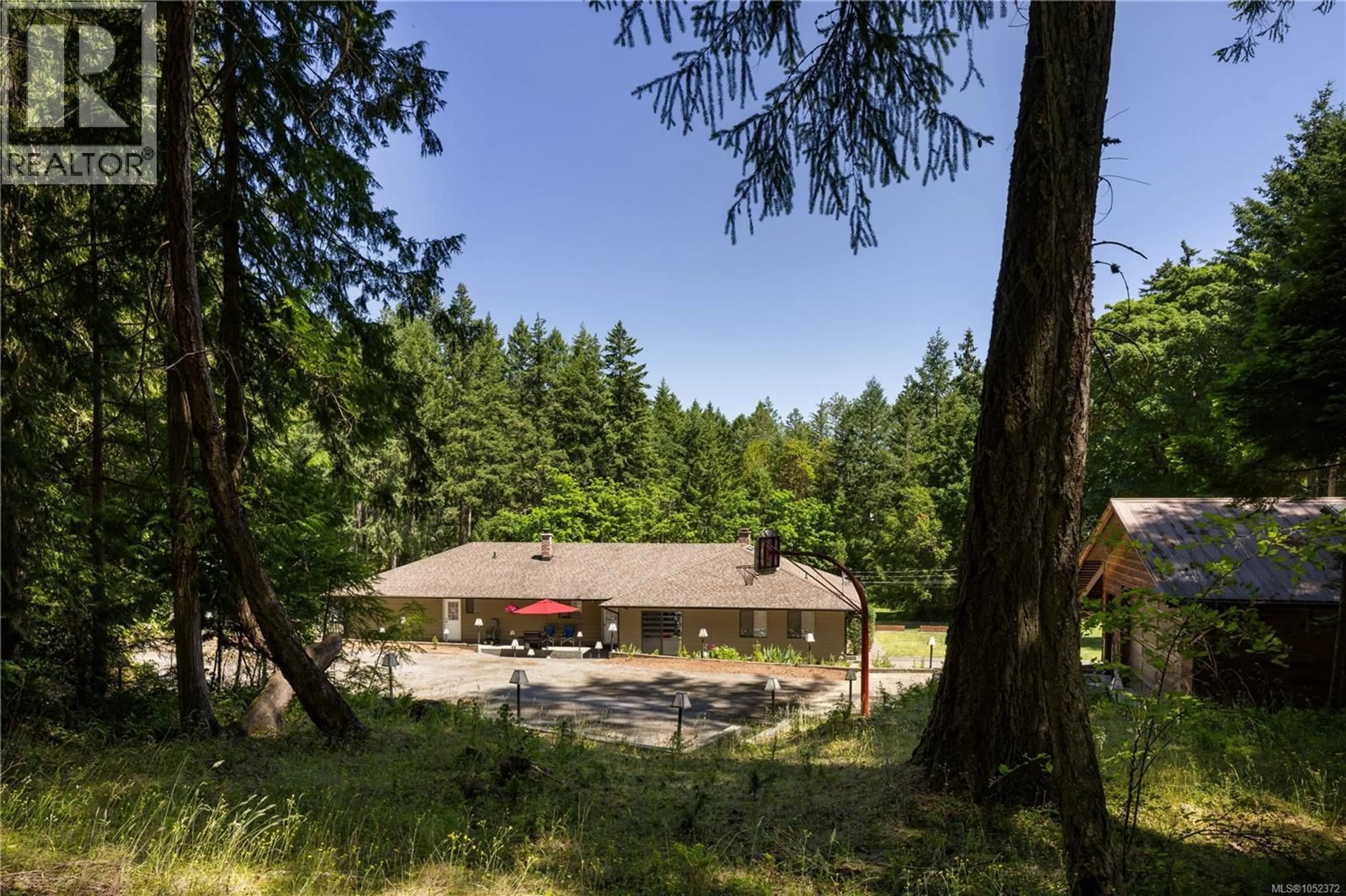 A pic from outside/outdoor area/front of a property/back of a property/a pic from drone, forest/trees view for 3428 JURIET ROAD, Nanaimo British Columbia V9G1C8