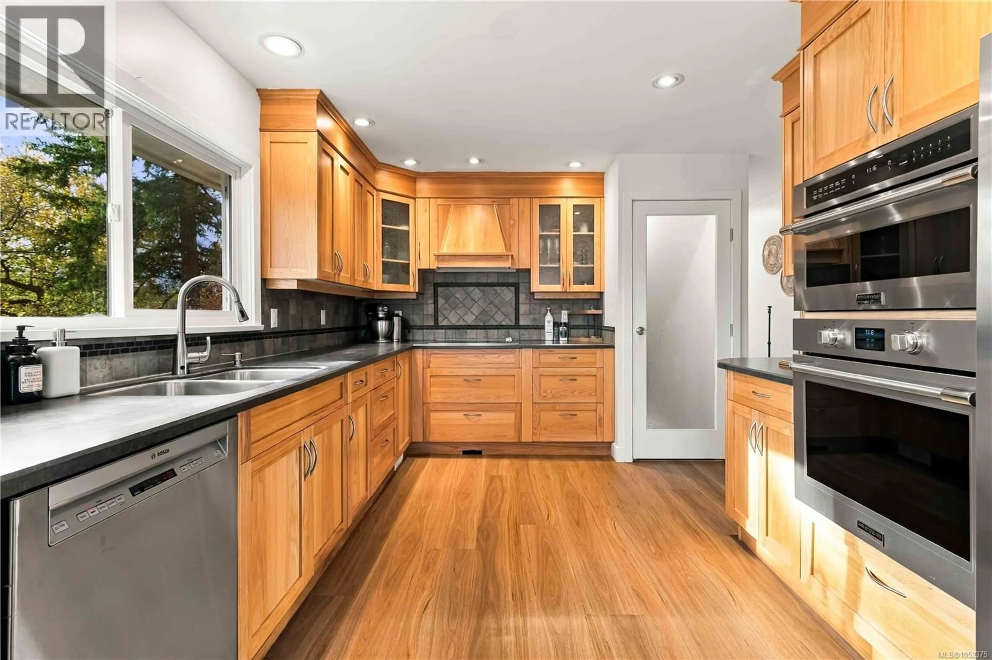 Contemporary kitchen, ceramic/tile floor for 1025 GREENRIDGE CRESCENT, Saanich British Columbia V8X3B8