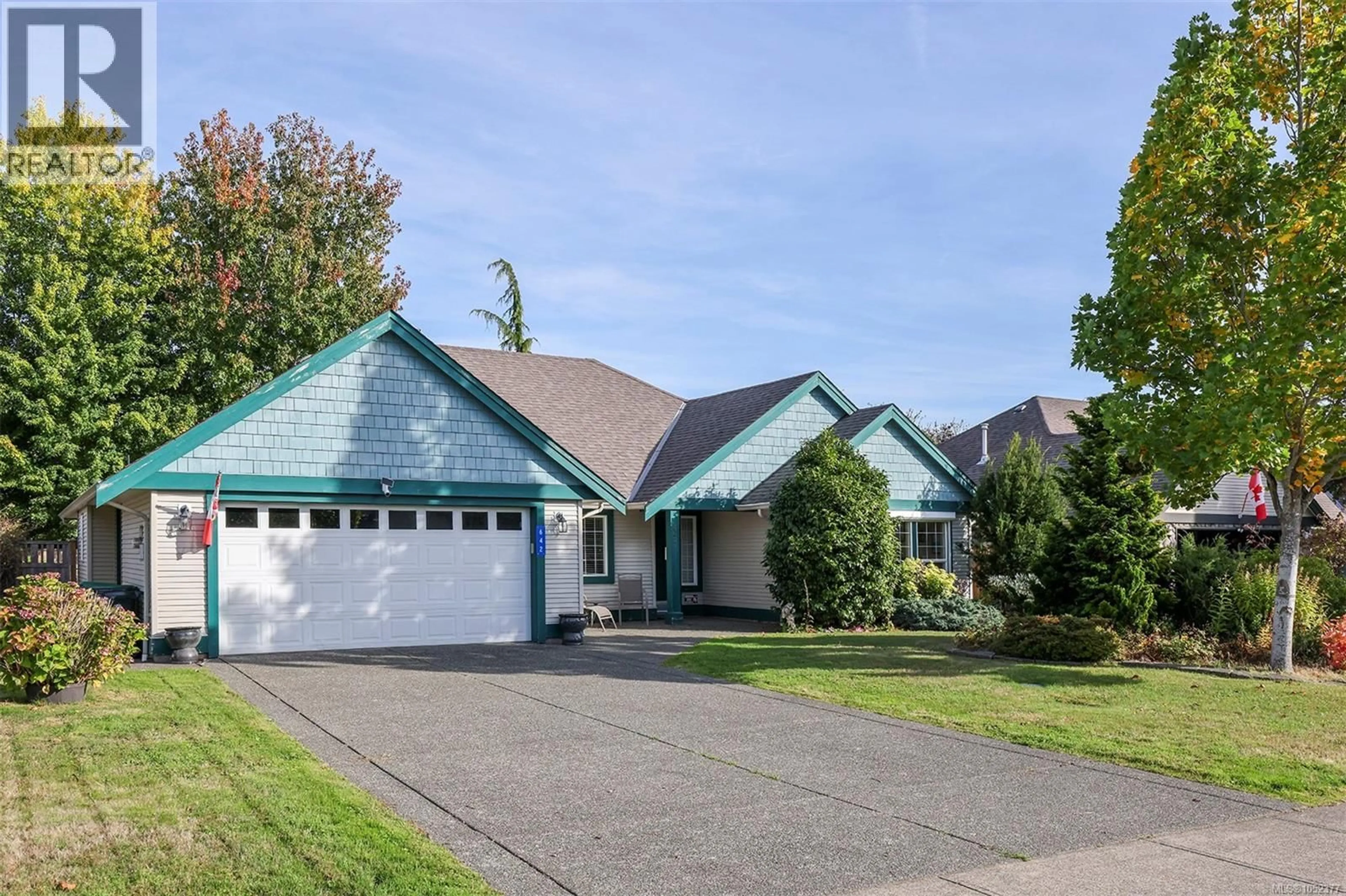 Home with vinyl exterior material, street for 642 OLYMPIC DRIVE, Comox British Columbia V9M4G8