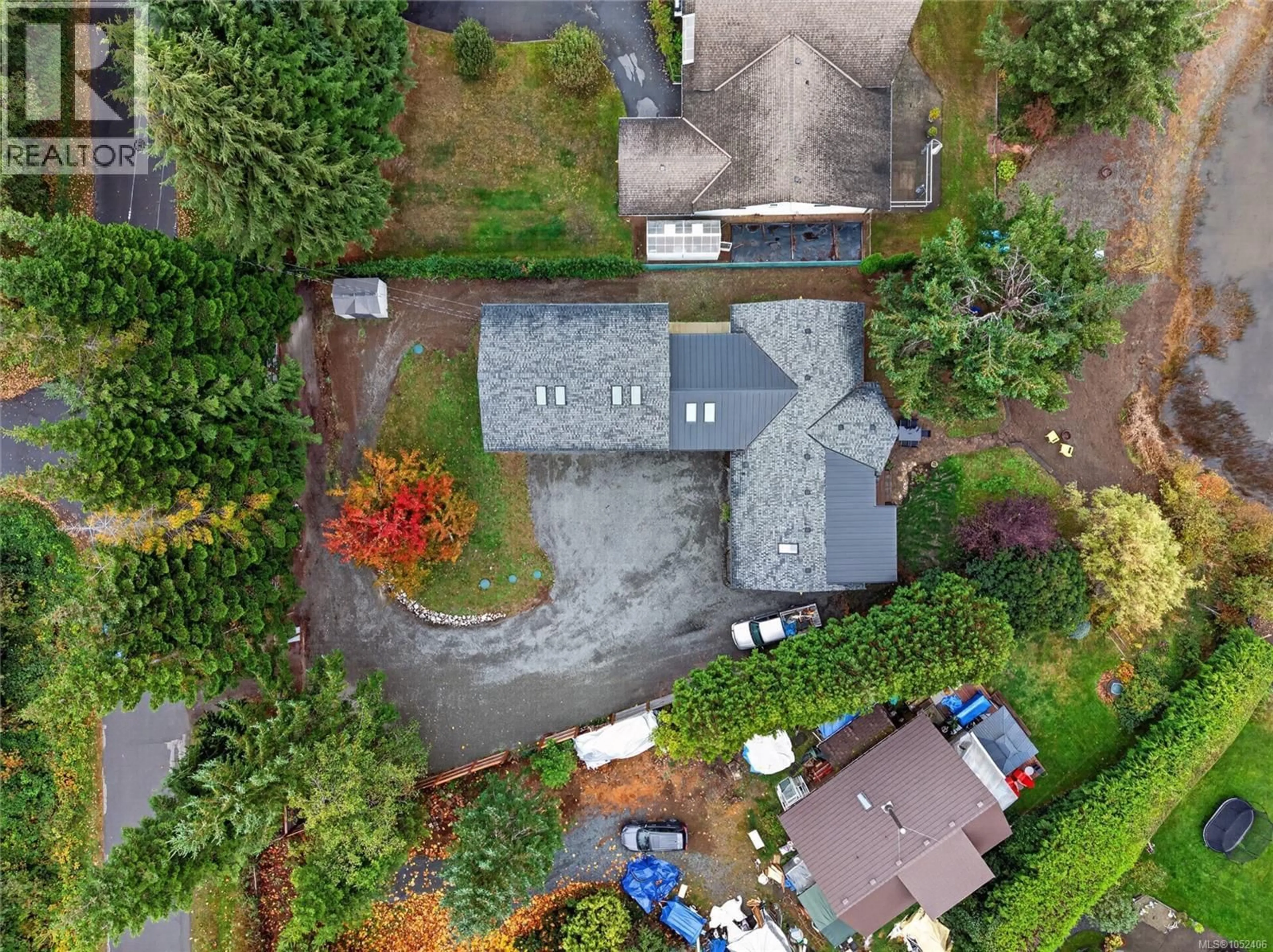 A pic from outside/outdoor area/front of a property/back of a property/a pic from drone, street for 9500 MARTIN PARK DRIVE, Black Creek British Columbia V9J1C4
