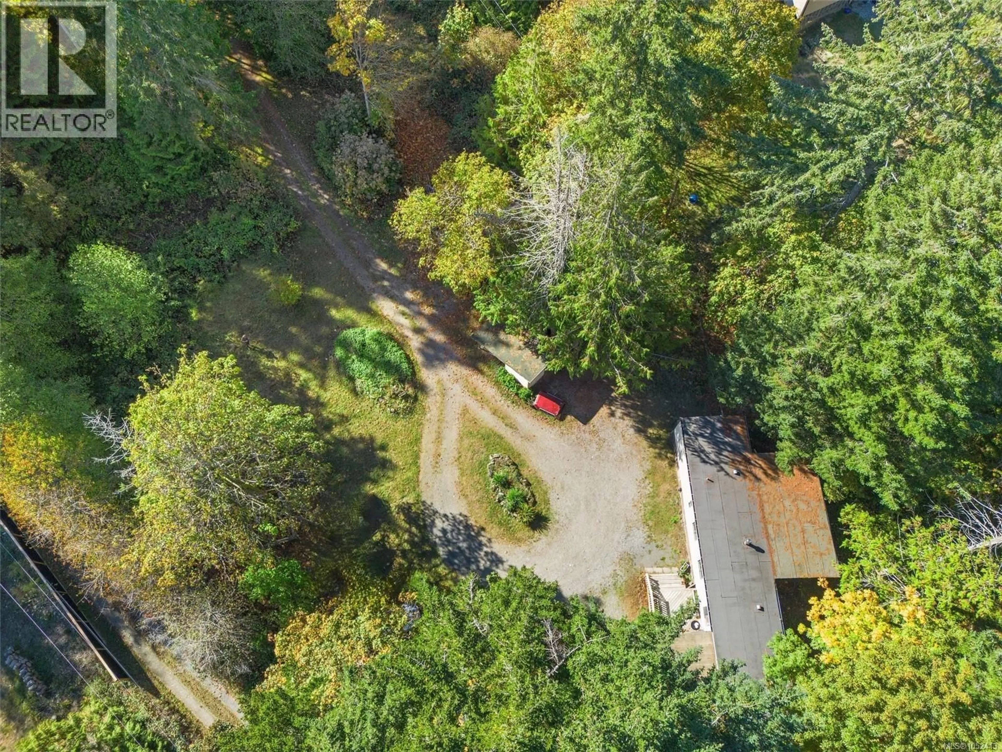 A pic from outside/outdoor area/front of a property/back of a property/a pic from drone, forest/trees view for 1549 SHAWNIGAN MILL BAY ROAD, Shawnigan Lake British Columbia V8H2A4