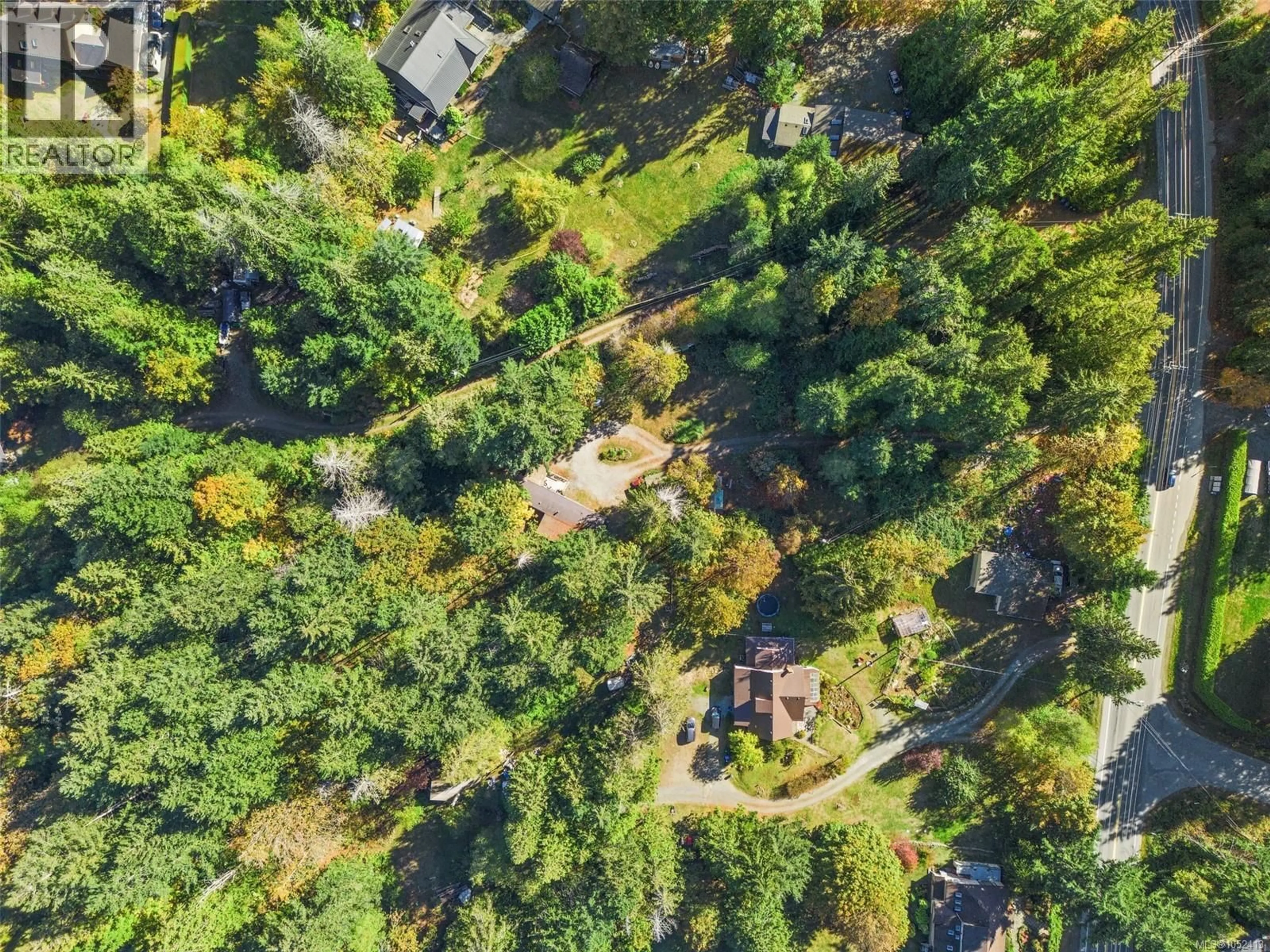 A pic from outside/outdoor area/front of a property/back of a property/a pic from drone, forest/trees view for 1549 SHAWNIGAN MILL BAY ROAD, Shawnigan Lake British Columbia V8H2A4