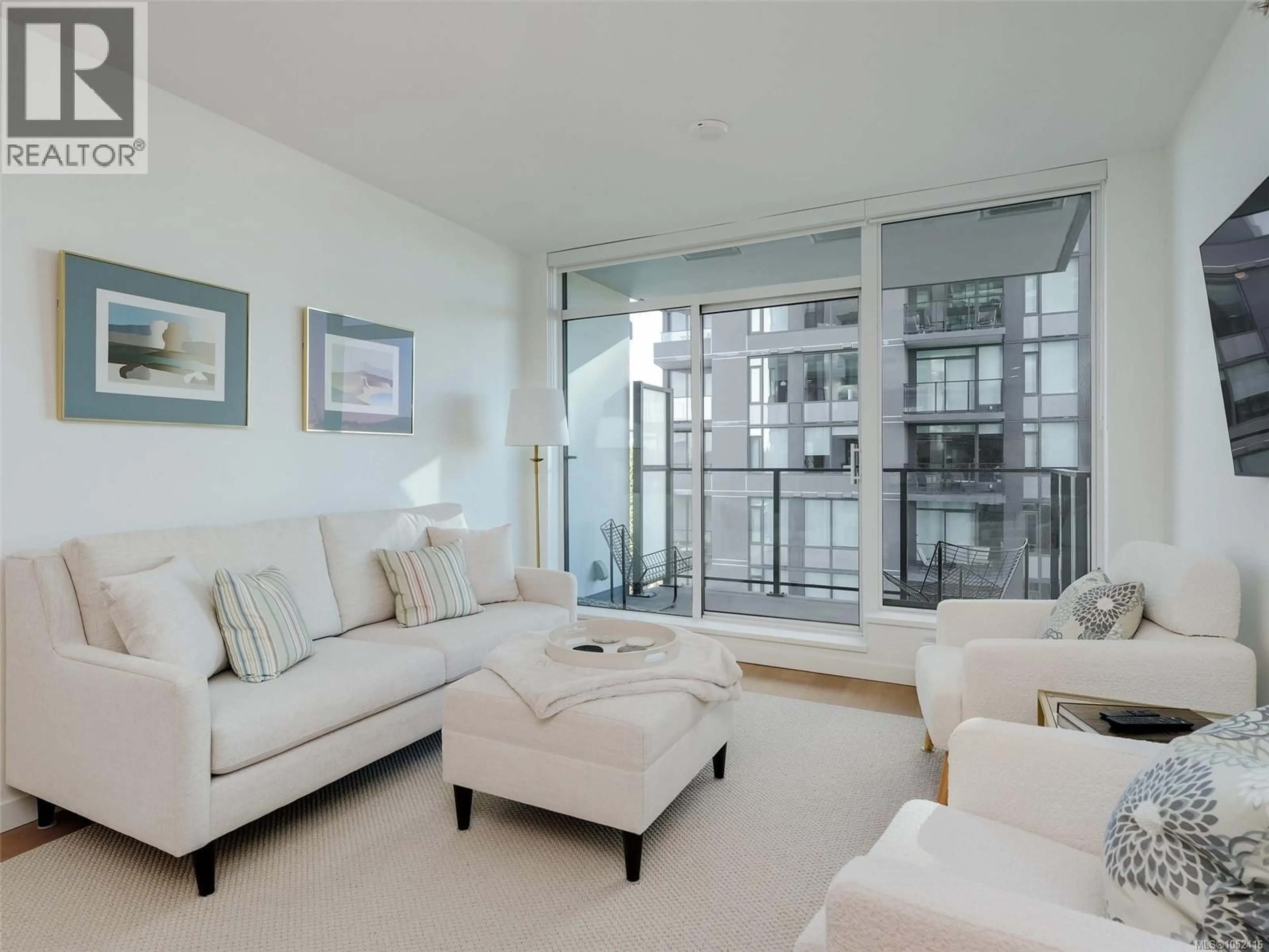 Living room with furniture, unknown for 606 - 363 TYEE ROAD, Victoria British Columbia V9A0B5