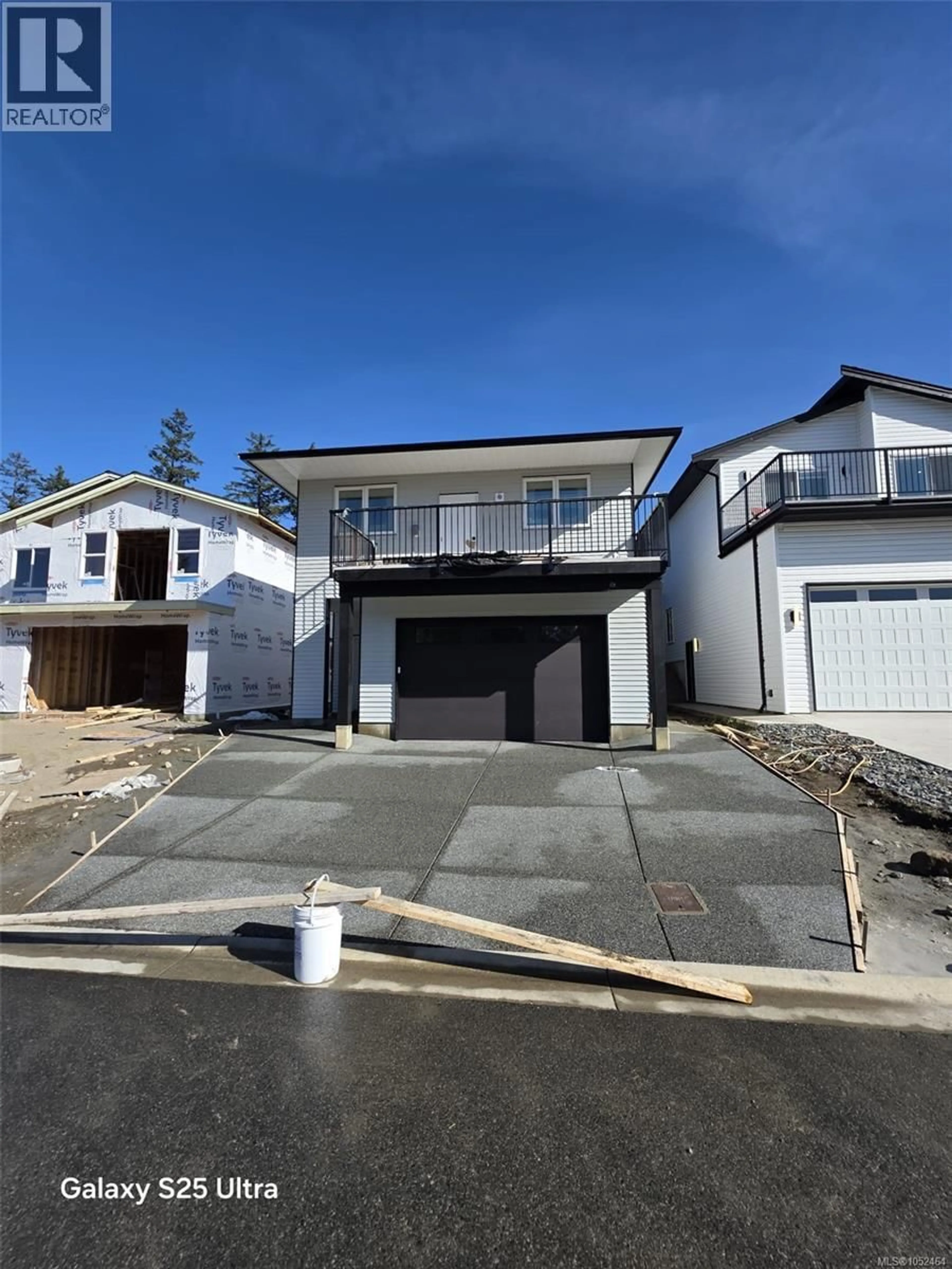 Home with vinyl exterior material, street for 905 OLD VICTORIA ROAD, Nanaimo British Columbia V9R5Z9