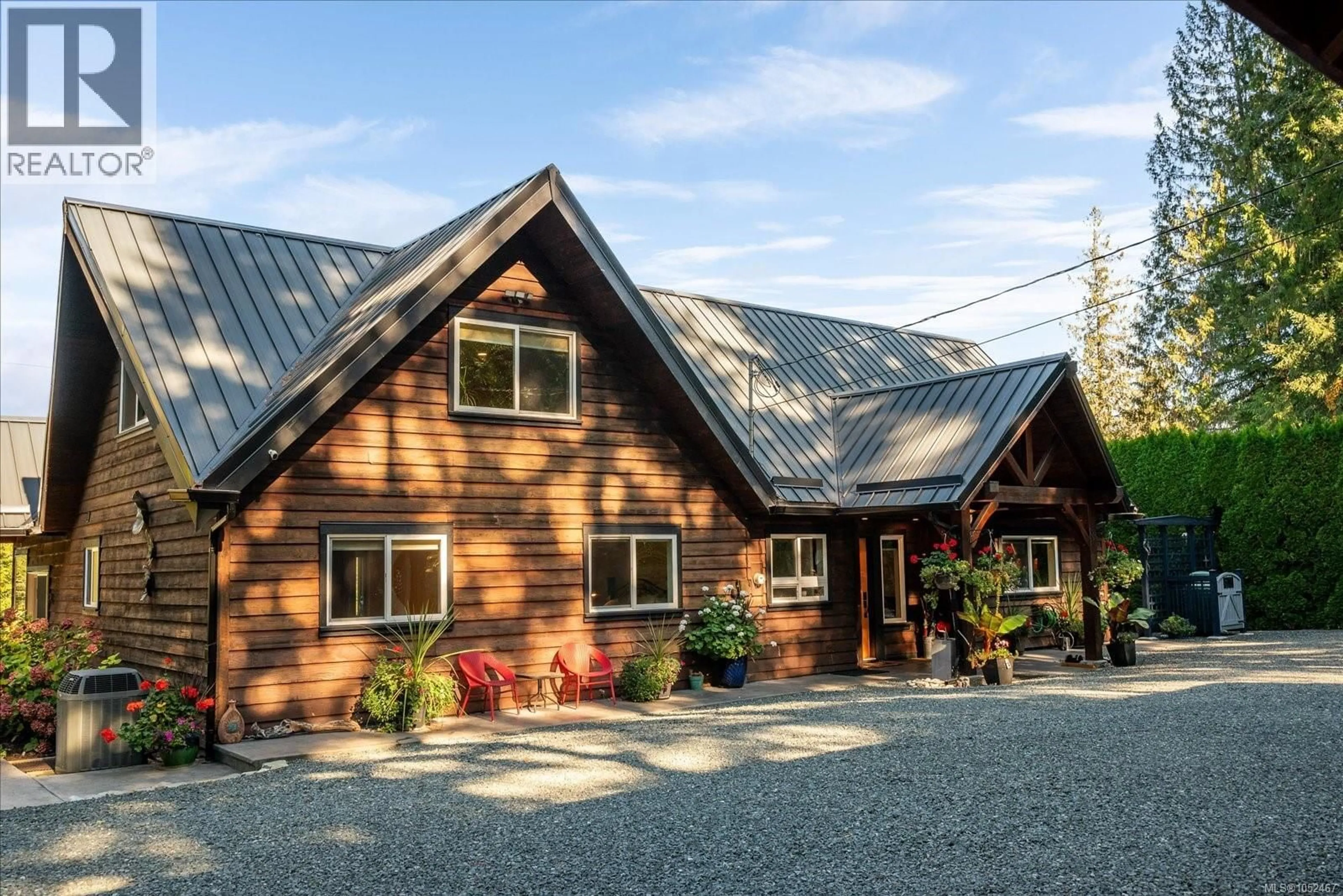 Home with vinyl exterior material, mountain view for 521 FOURNEAU WAY, Parksville British Columbia V9P2J7