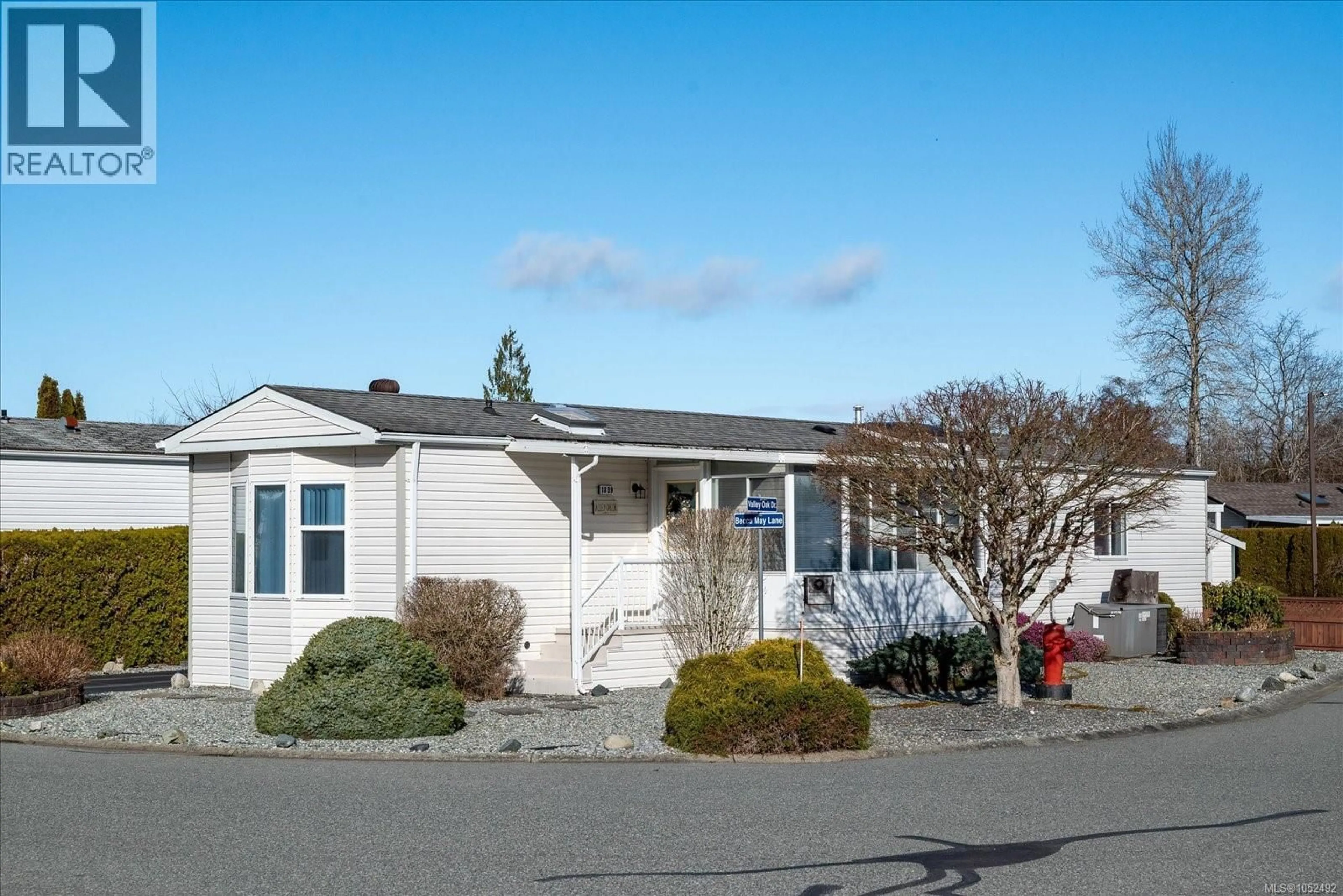 Home with vinyl exterior material, street for 1839 VALLEY OAK DRIVE, Nanaimo British Columbia V9R6N1
