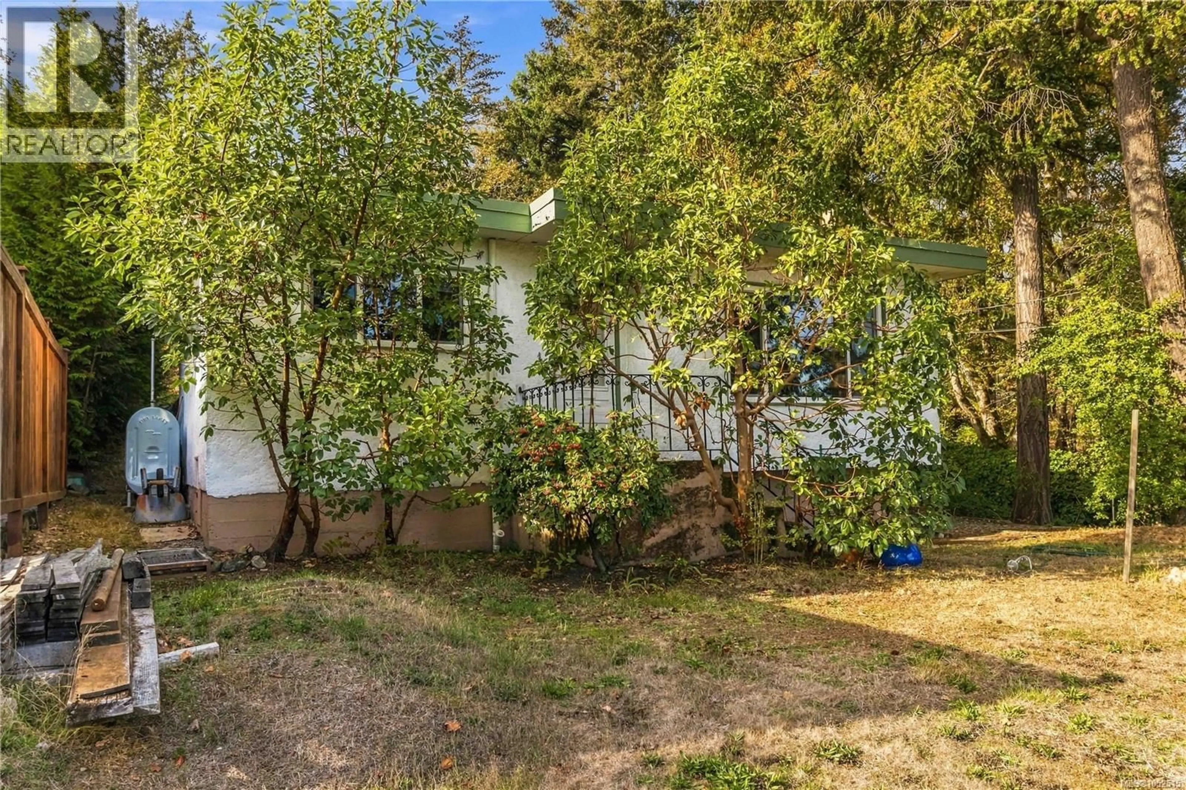 A pic from outside/outdoor area/front of a property/back of a property/a pic from drone, street for 3904 WILKINSON ROAD, Saanich British Columbia V8Z5A2