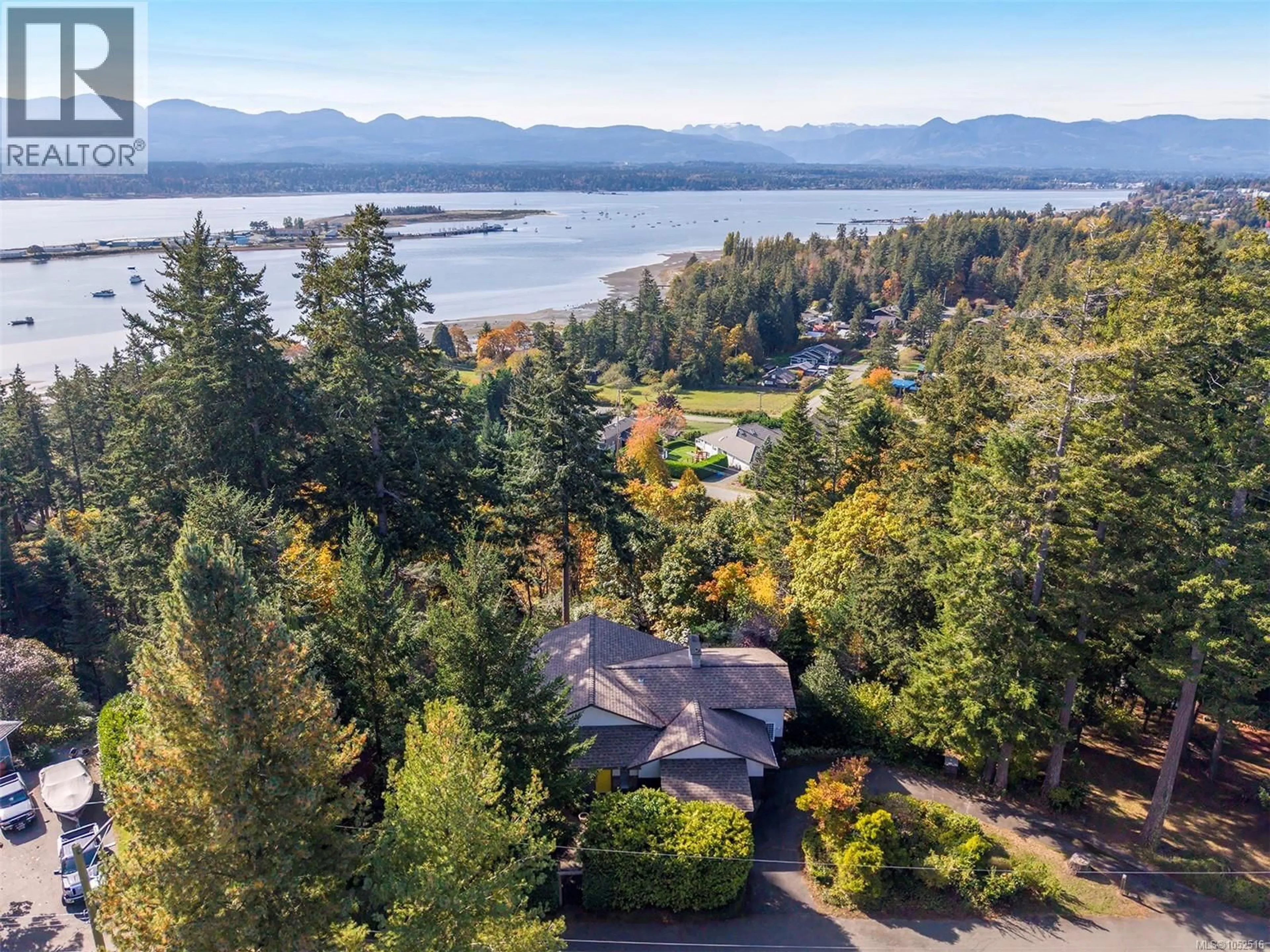 A pic from outside/outdoor area/front of a property/back of a property/a pic from drone, water/lake/river/ocean view for 1183 MOORE ROAD, Comox British Columbia V9M3X1