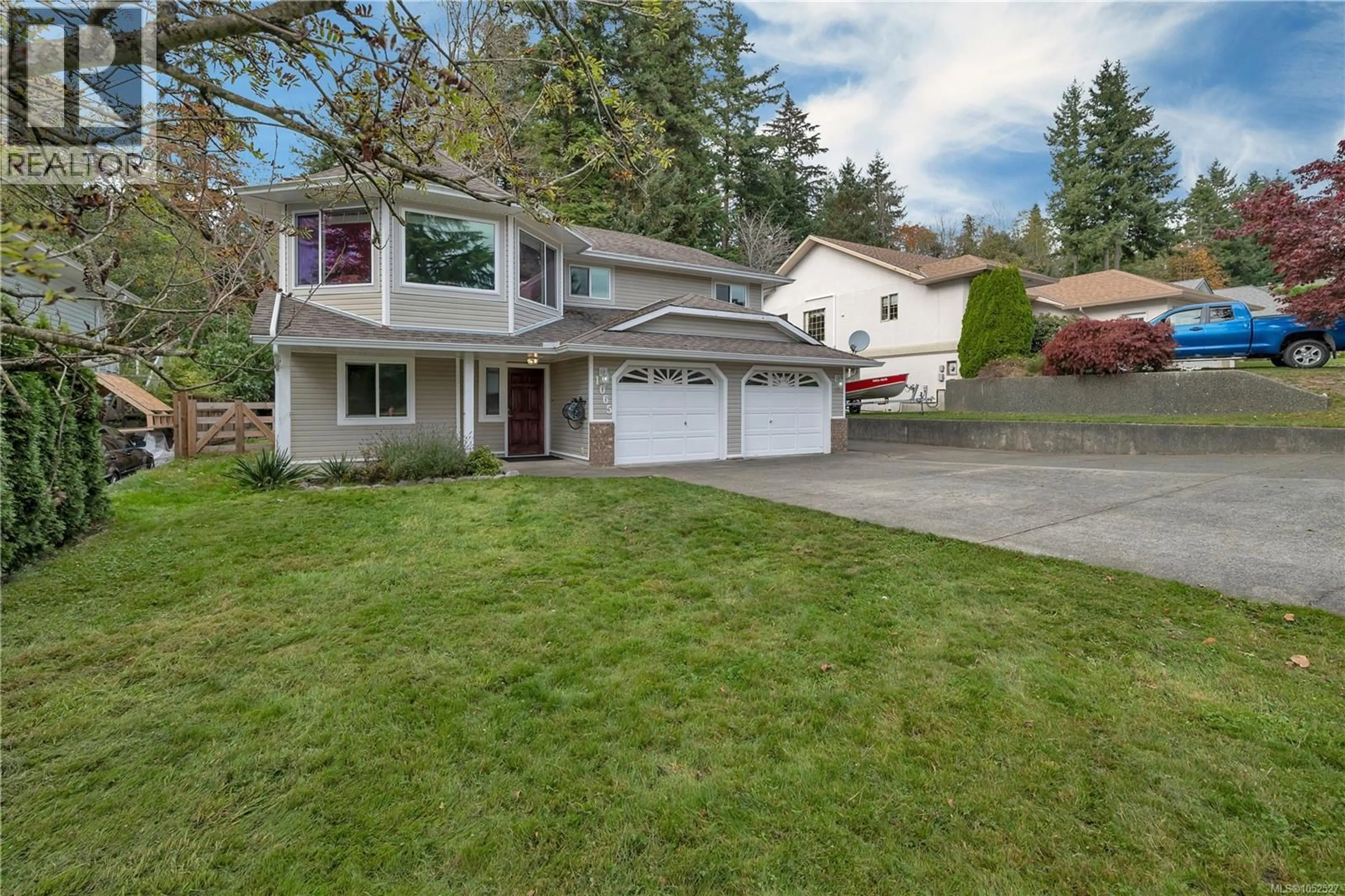 Home with vinyl exterior material, street for 1065 SPRINGBOK ROAD, Campbell River British Columbia V9W7K7