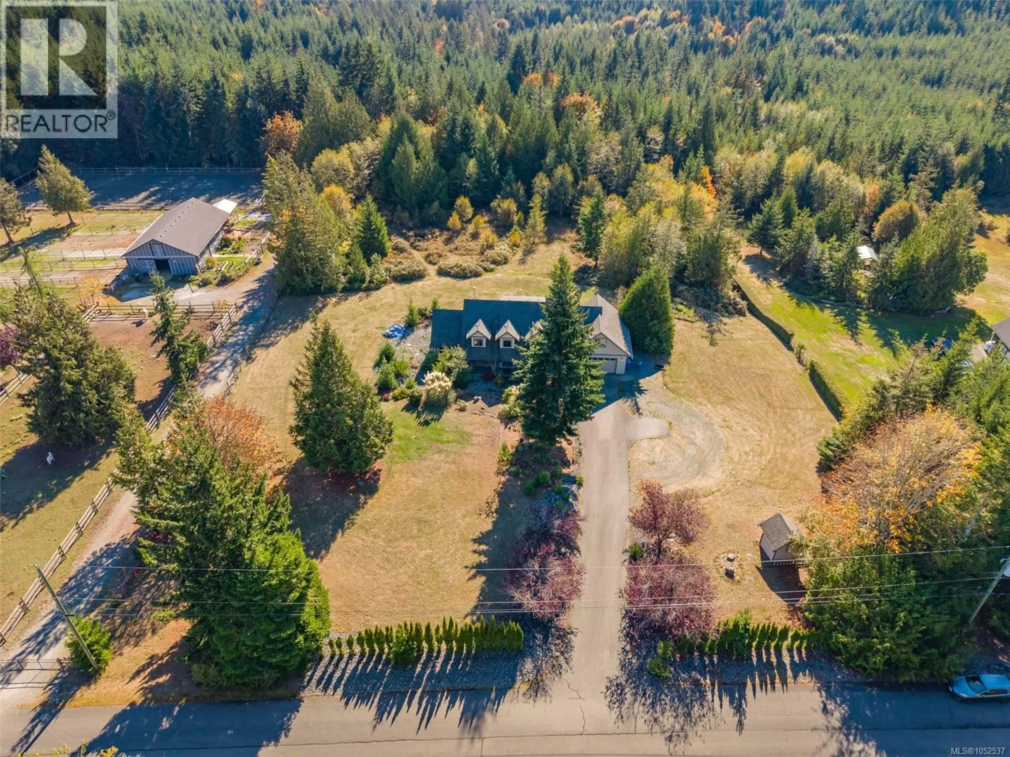 A pic from outside/outdoor area/front of a property/back of a property/a pic from drone, forest/trees view for 762 MEMORY LANE, Mill Bay British Columbia V0R2P4